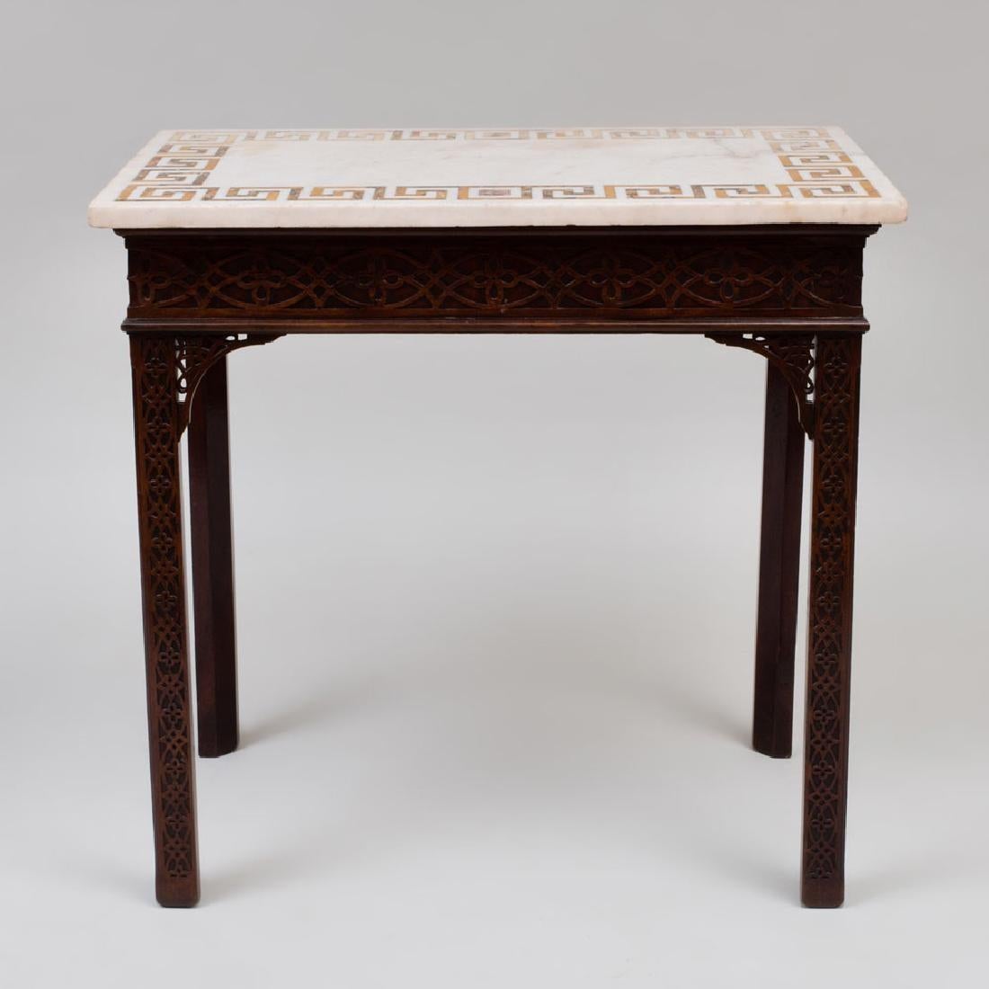 George III period mahogany fratework console table with white Carrara marble top.
With inlaid Greek key in Sienna marble.
