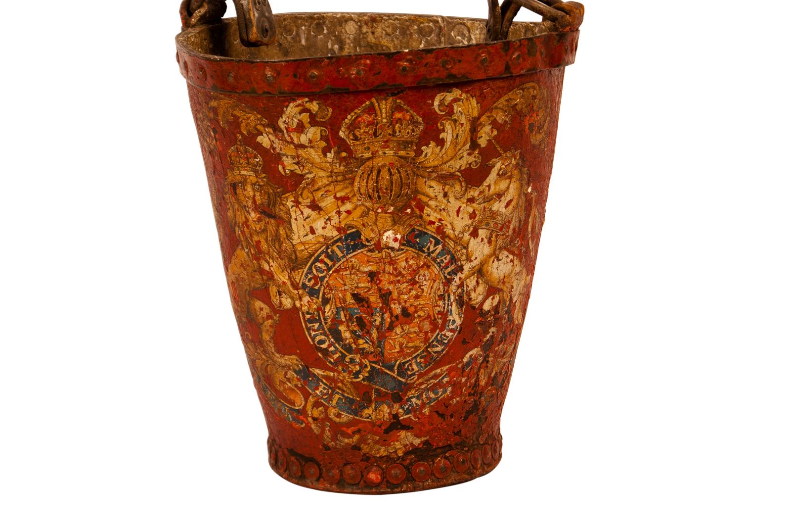 A late 18th century English George III period red leather fire bucket with a armorial, circa 1780.. Substantial original decoration. Some loss to paint and leather. Great colorful example of a rare piece.