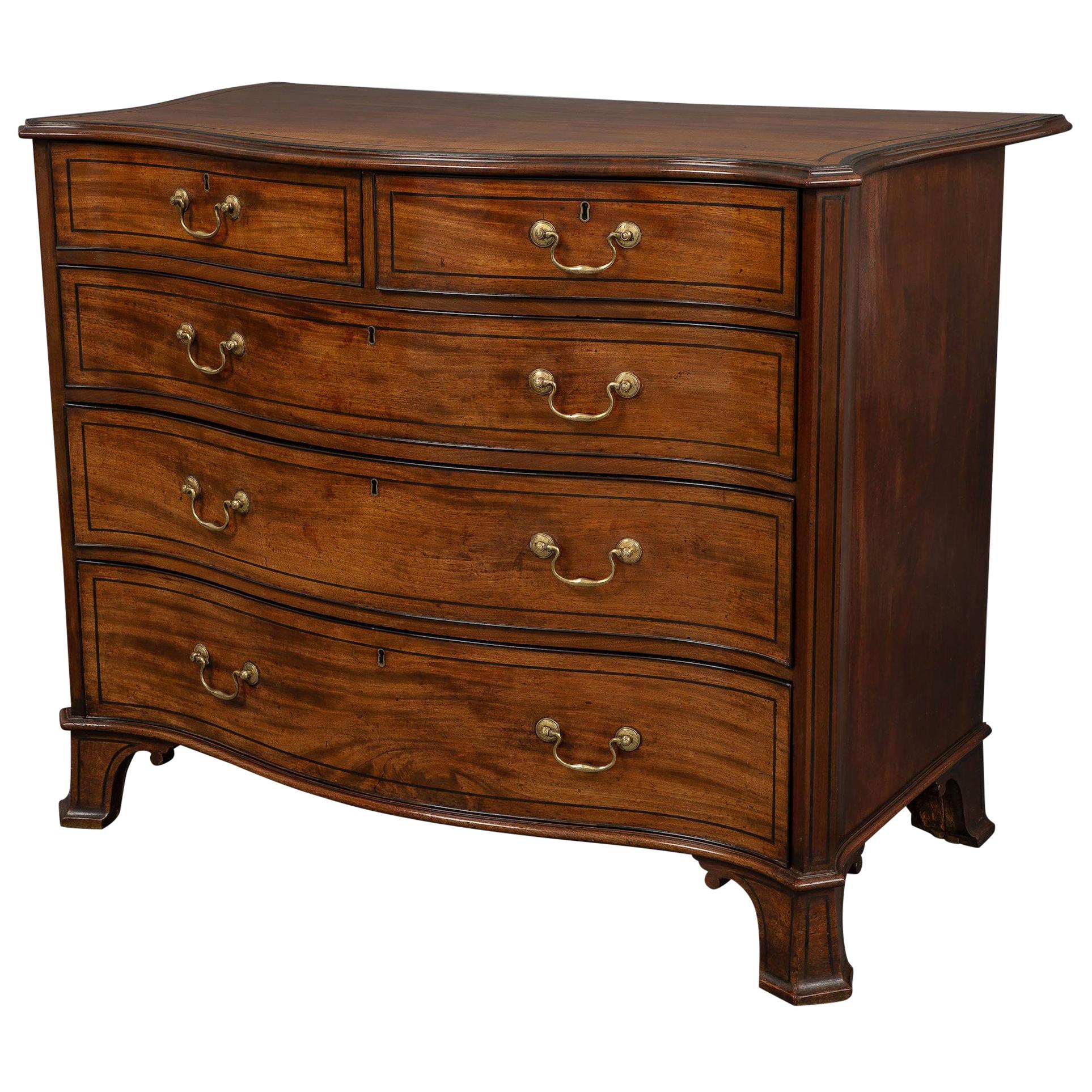 George III Period Serpentine-Fronted Chest of Drawers in the Manner of Thomas For Sale