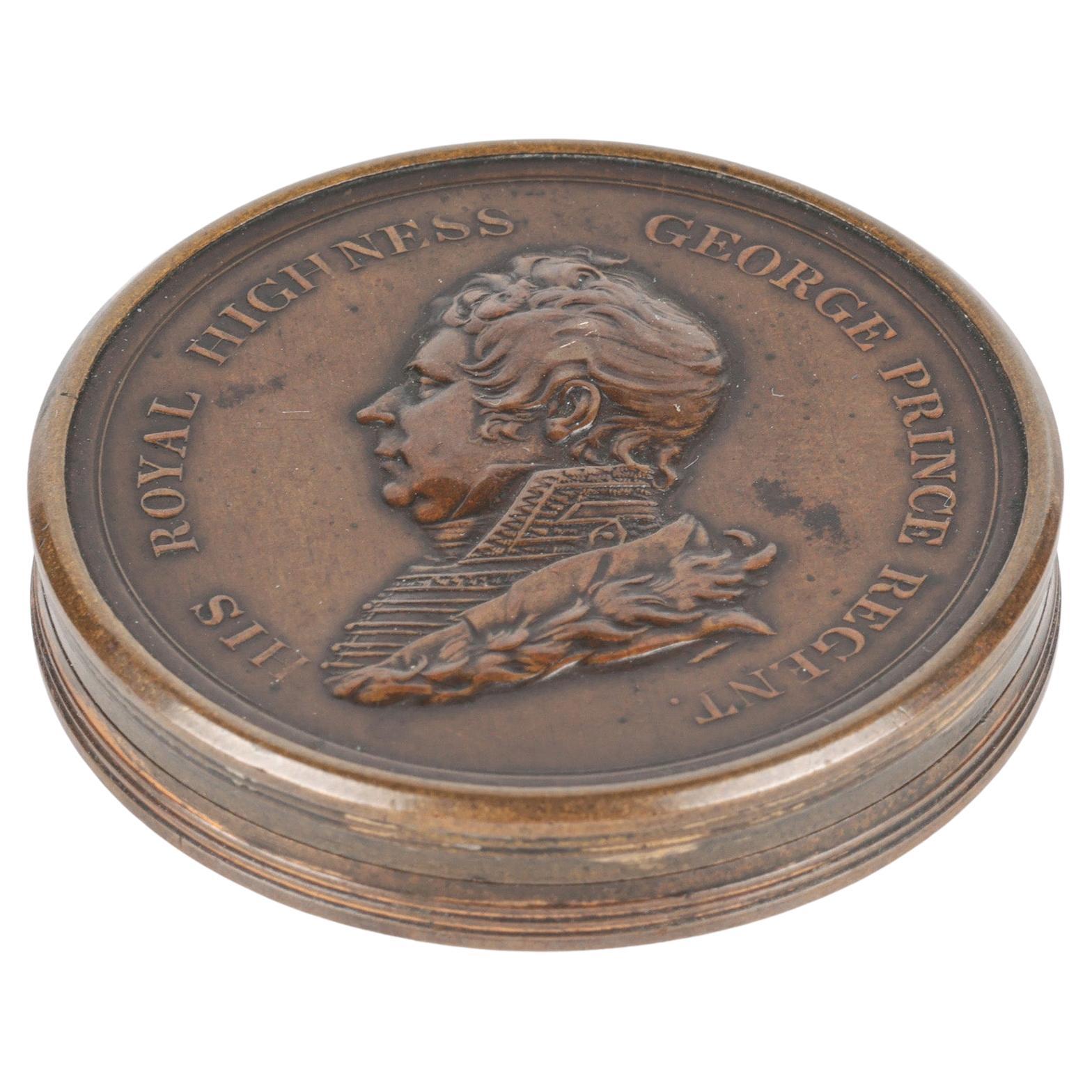 A rare and very interesting antique Georgian bronze medallion cased set of printed discs titled CHRONOLOGY OF THE SOVEREIGNS OF ENGLAND and believed to have been produced around 1815. The set comprises of 16 circular discs, printed on both sides
