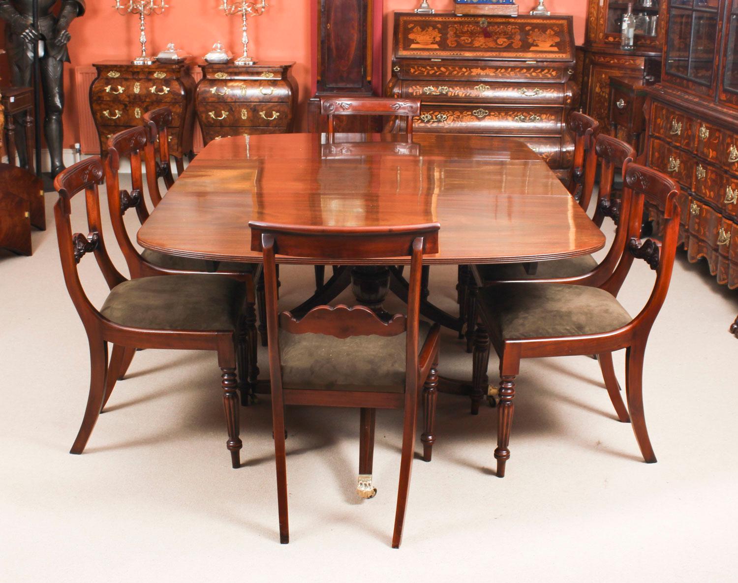 This is an elegant dining set comprising an antique George III Regency period dining table, circa 1820 in date, with a fabulous set of eight bespoke Regency style dining chairs.

The table has one additional leaf and is raised on twin 