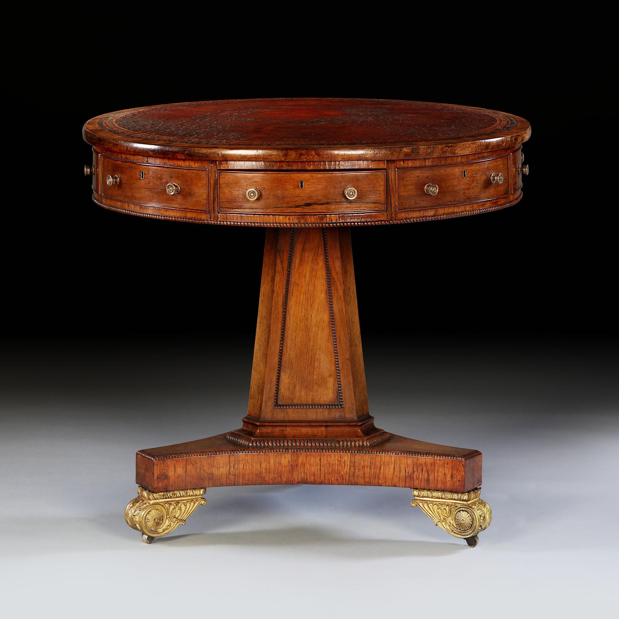 Drawn by fabulous design and exceptional originality........

George III rosewood and mahogany drum table of small proportions, retaining its original tooled burgundy leather, gilt brass furniture and age patinated surface.

One of the interesting