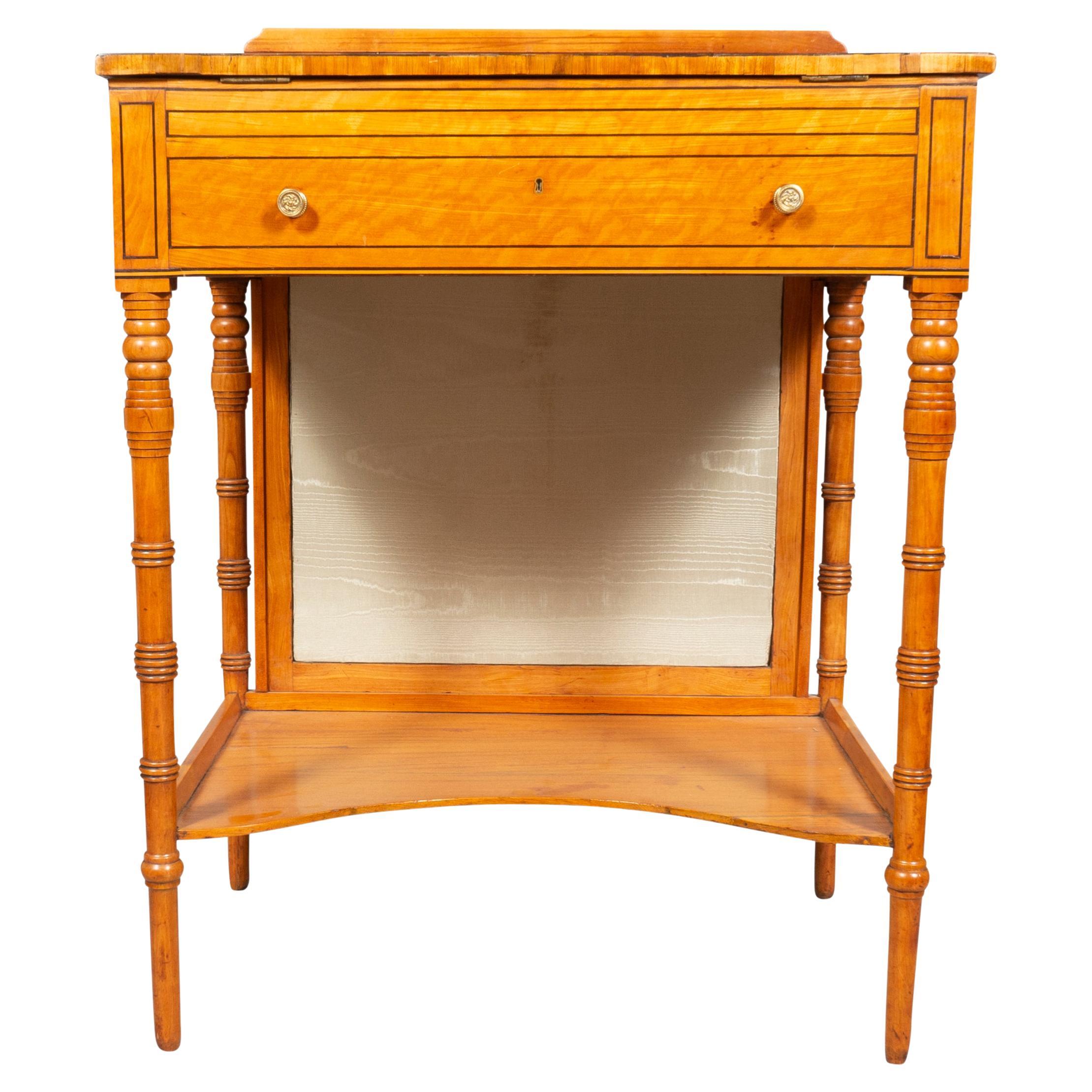 Rectangular  adjustable top with removable book holder. Adjustable fire screen and drawer and slide. Lower shelf joining circular bamboo turned tapered legs.
With Hyde Park Antiques. NYC.