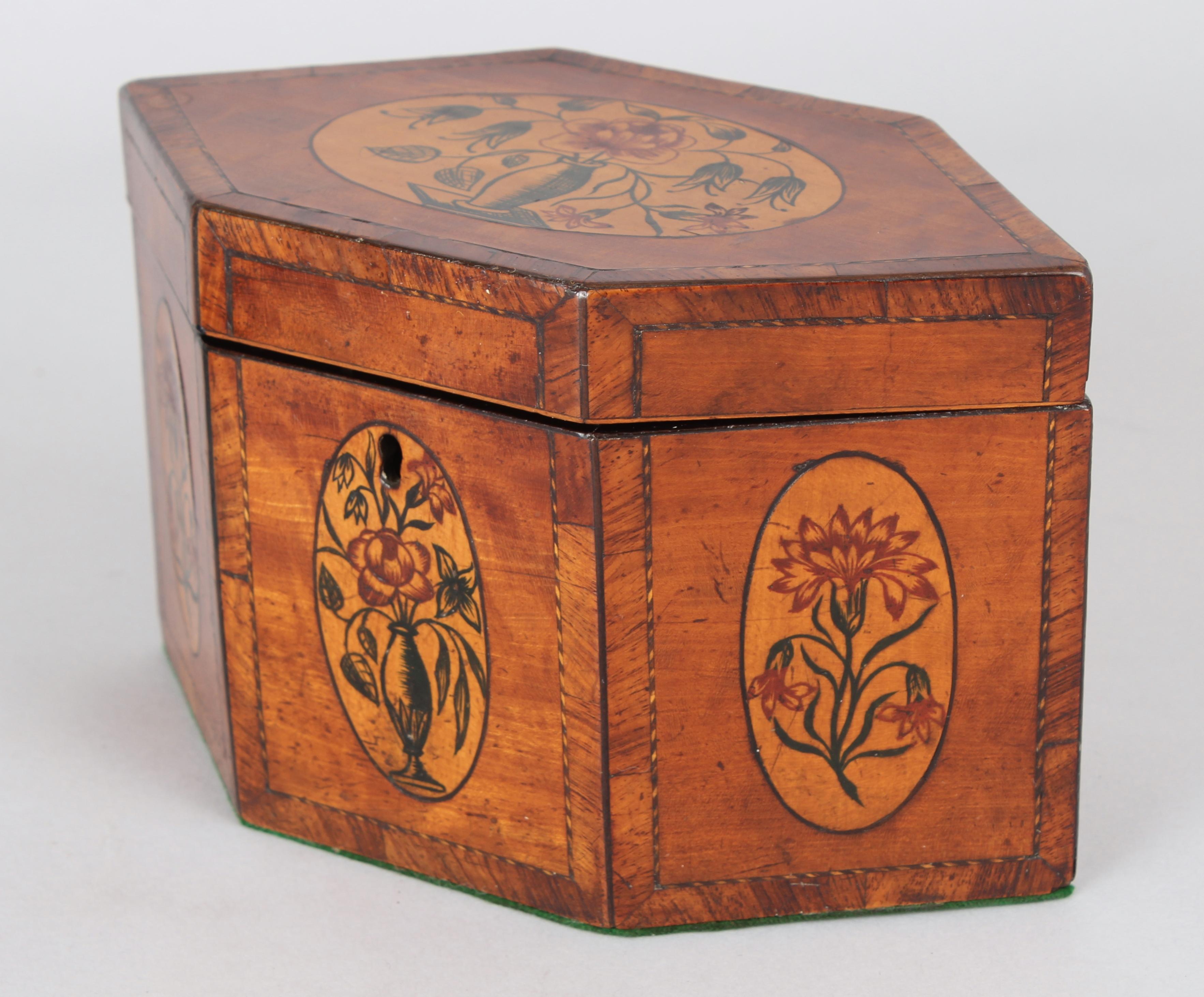 George III satinwood hexagonal tea-caddy with four oval pen-work panels of vases-of-flowers; with inner lid.