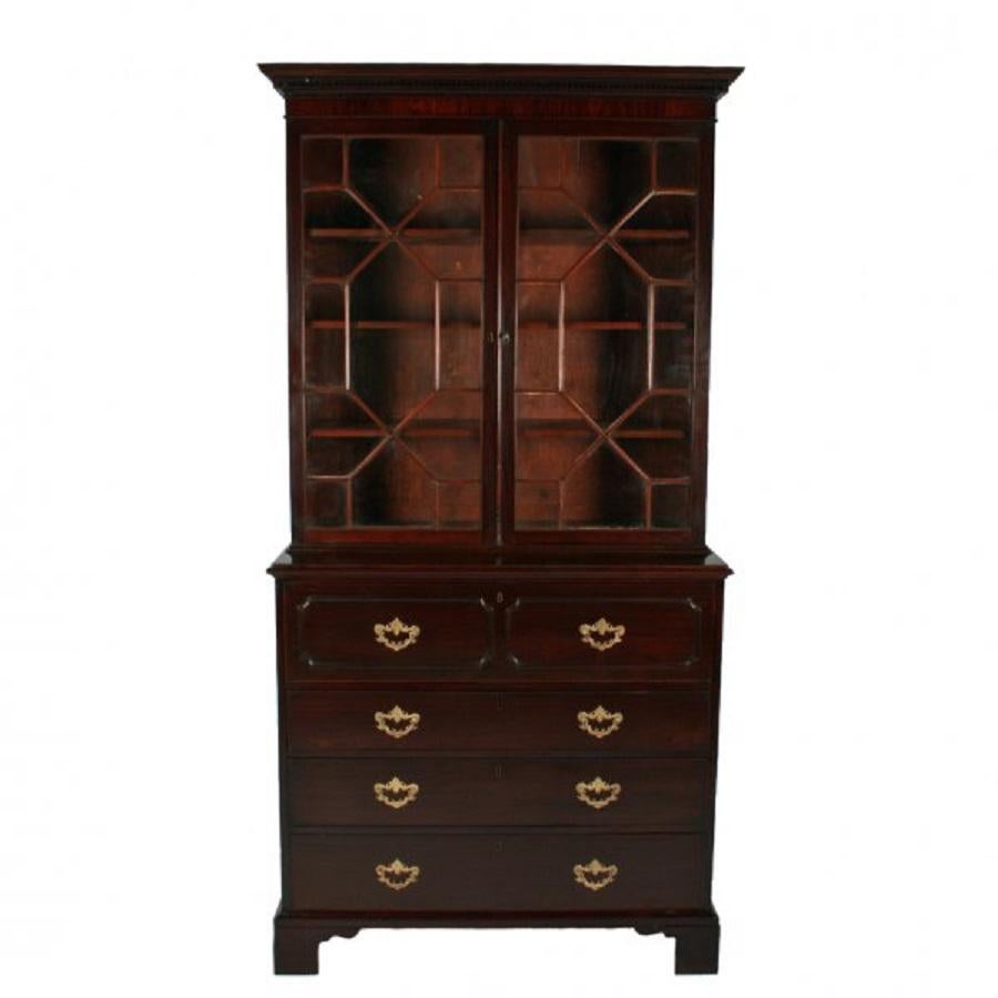 - 18th century
- Georgian mahogany
- Fitted desk

A late 18th century George III mahogany secretaire chest with a bookcase top.

The secretaire chest has a fitted top drawer with a fall front writing surface, inside there are seven mahogany