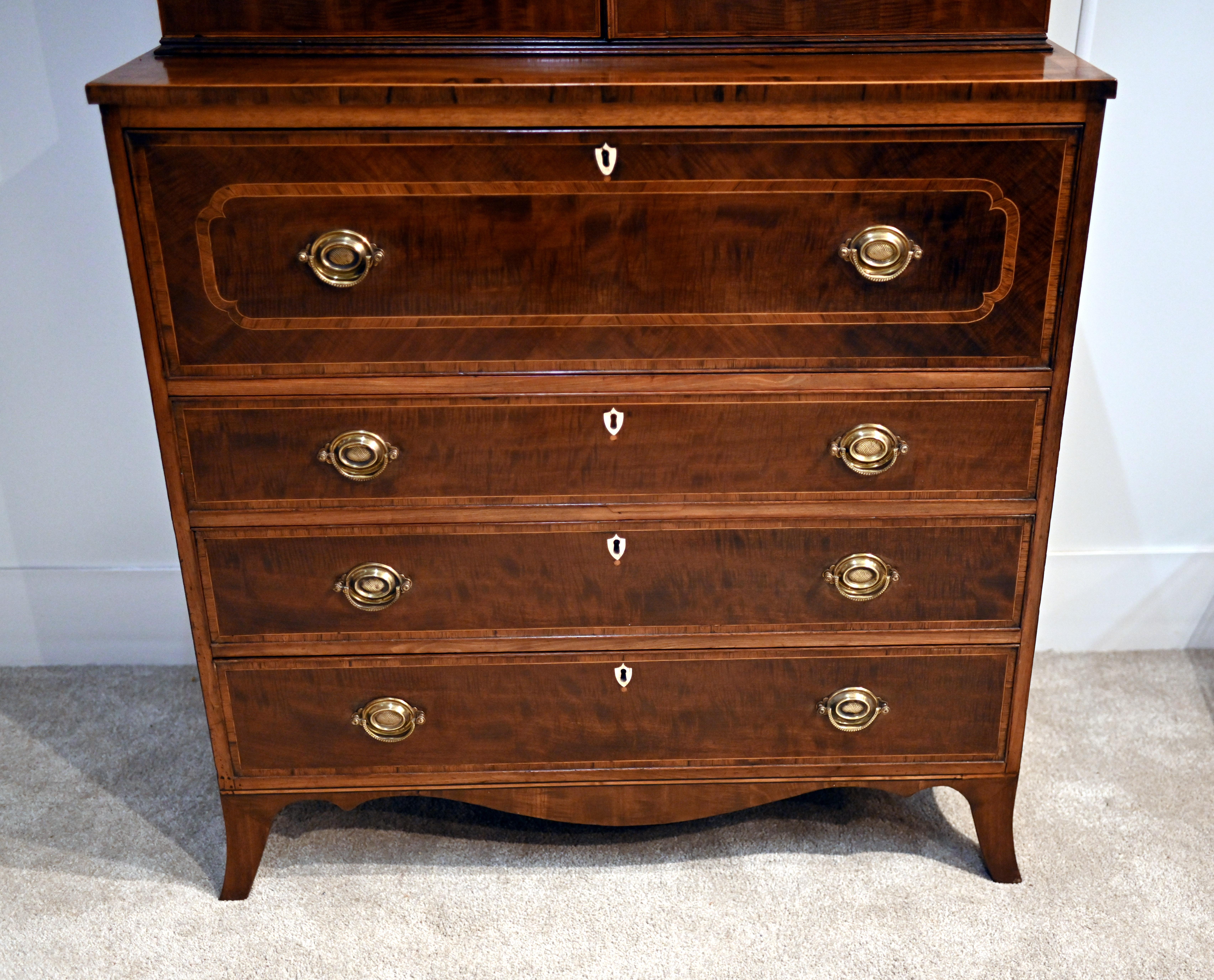 Simply stunning George III secretaire bookcase in mahogany Lovingly restored so in great shape Lots of storage with drawers below and glass covered bookcase to the top Desk section - secretaire - opens out to reveal writing surface surrounded by