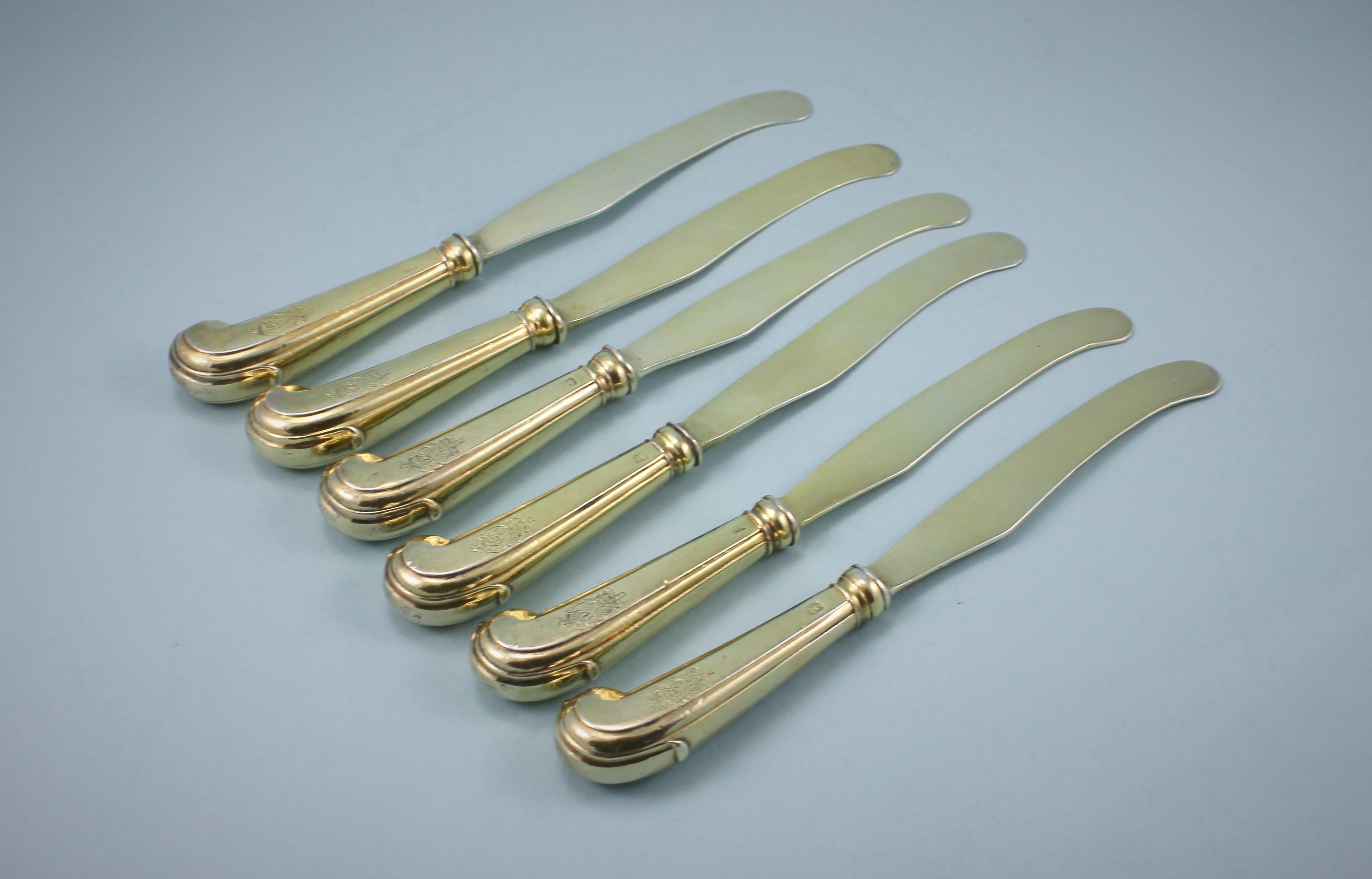 Handsome set of six George III silver gilt dessert knives.
Maker: William Abdy I. London circa 1765
The crest on one side of the handle shows the Royal crest, coronet and Garter motto as used by Ambassadors and Ministers as well as the