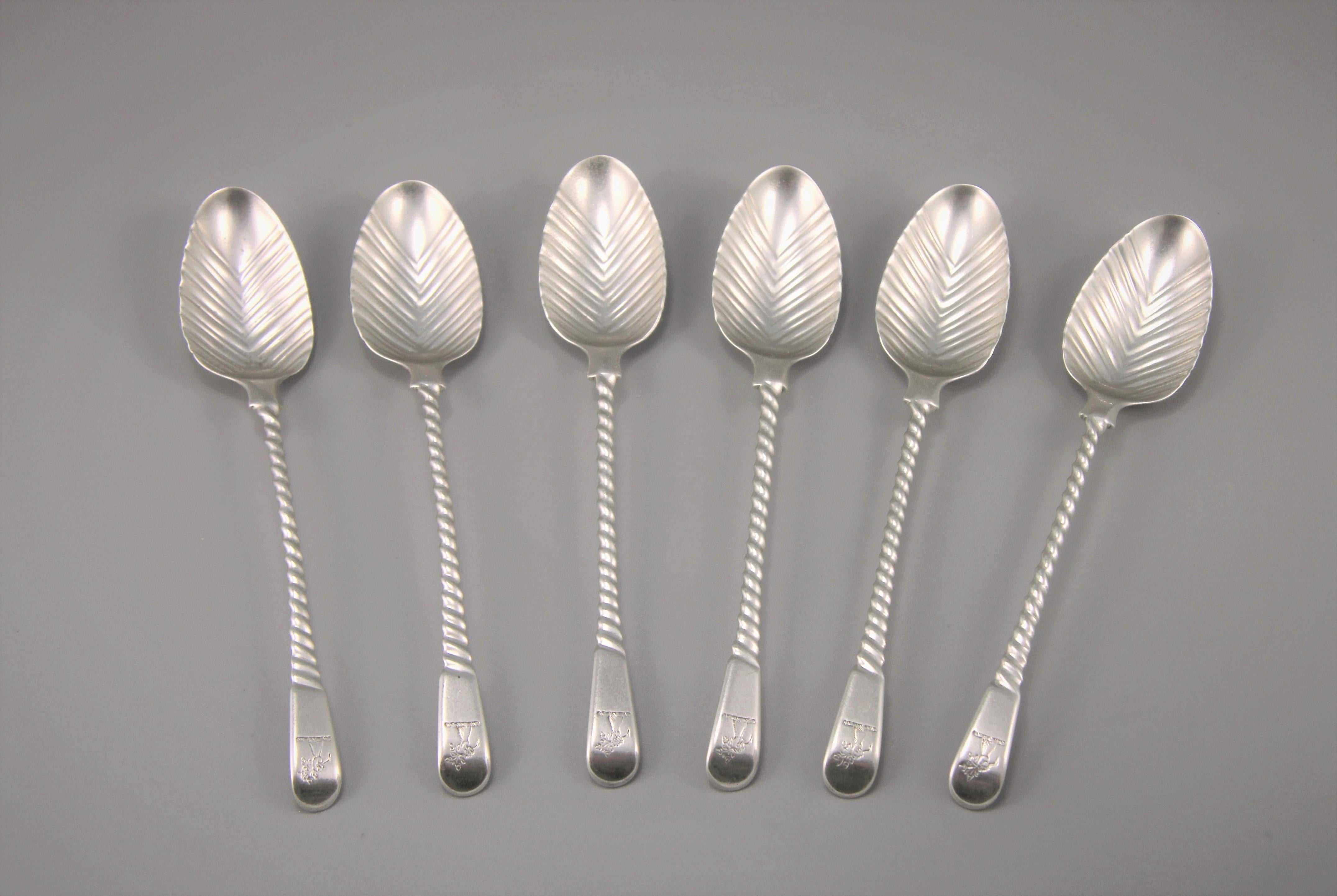 Unusual set of six George III sterling silver spiral handled teaspoons. 
Makers: Thomas & William Chawner, London, circa 1770. 

The bowl of the teaspoon is fashioned with a fluted v-shaped design which is repeated on the reverse. The spiral