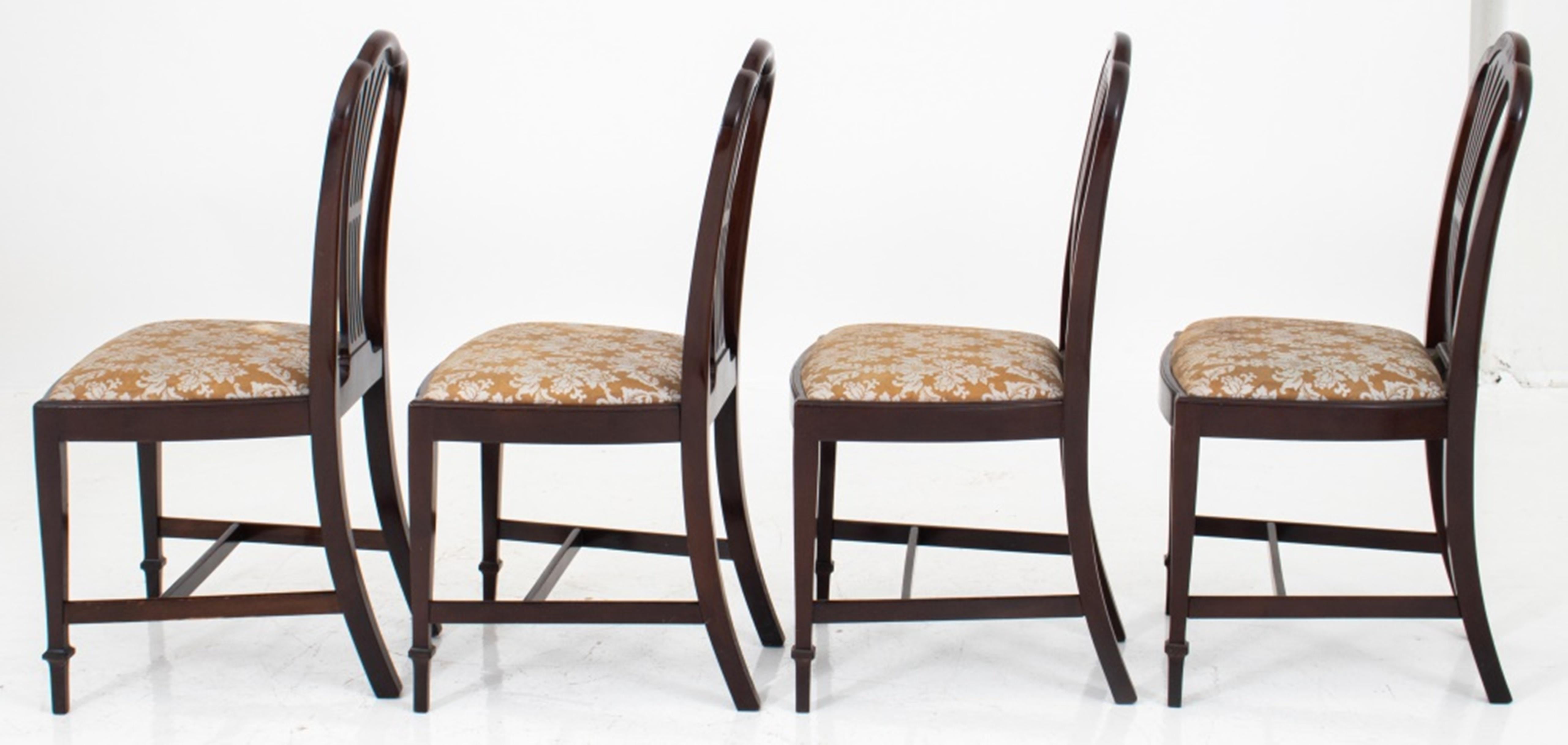 Set of four (4) George III style chairs in the manner of Thomas Sheraton (British 1751-1803) with shaped backs and reticulated back splats above shaped rectangular drop in seats on square tapering legs.  37