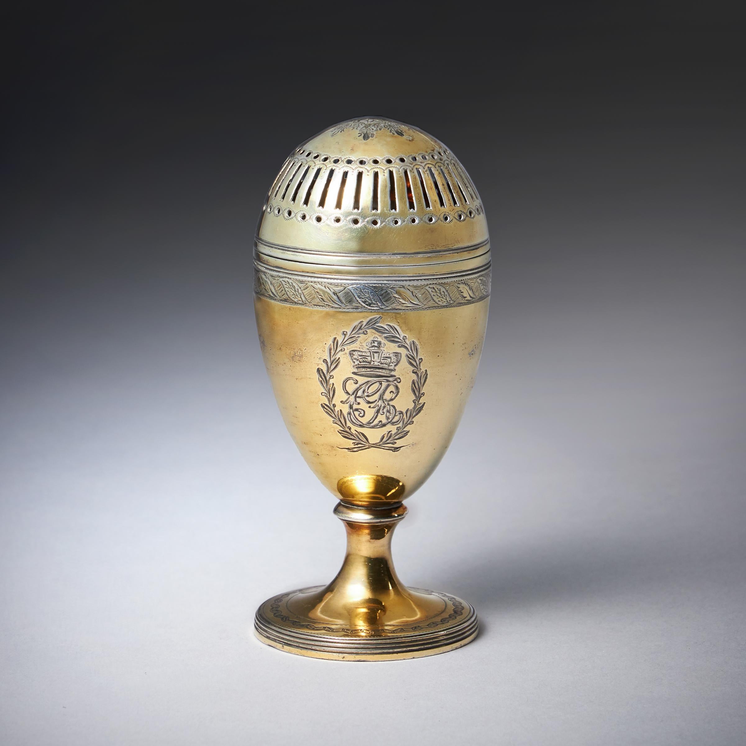Royal Interest 

A George III silver-gilt pepper pot by John Emes, London 1798. Engraved cypher of Queen Charlotte

The vase outline is with an engraved cypher of Queen Charlotte in a laurel wreath and a foliate border to the rim. the domed