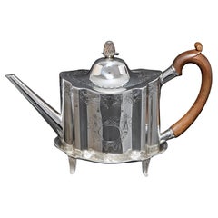 Tetera y soporte de plata de Jorge III