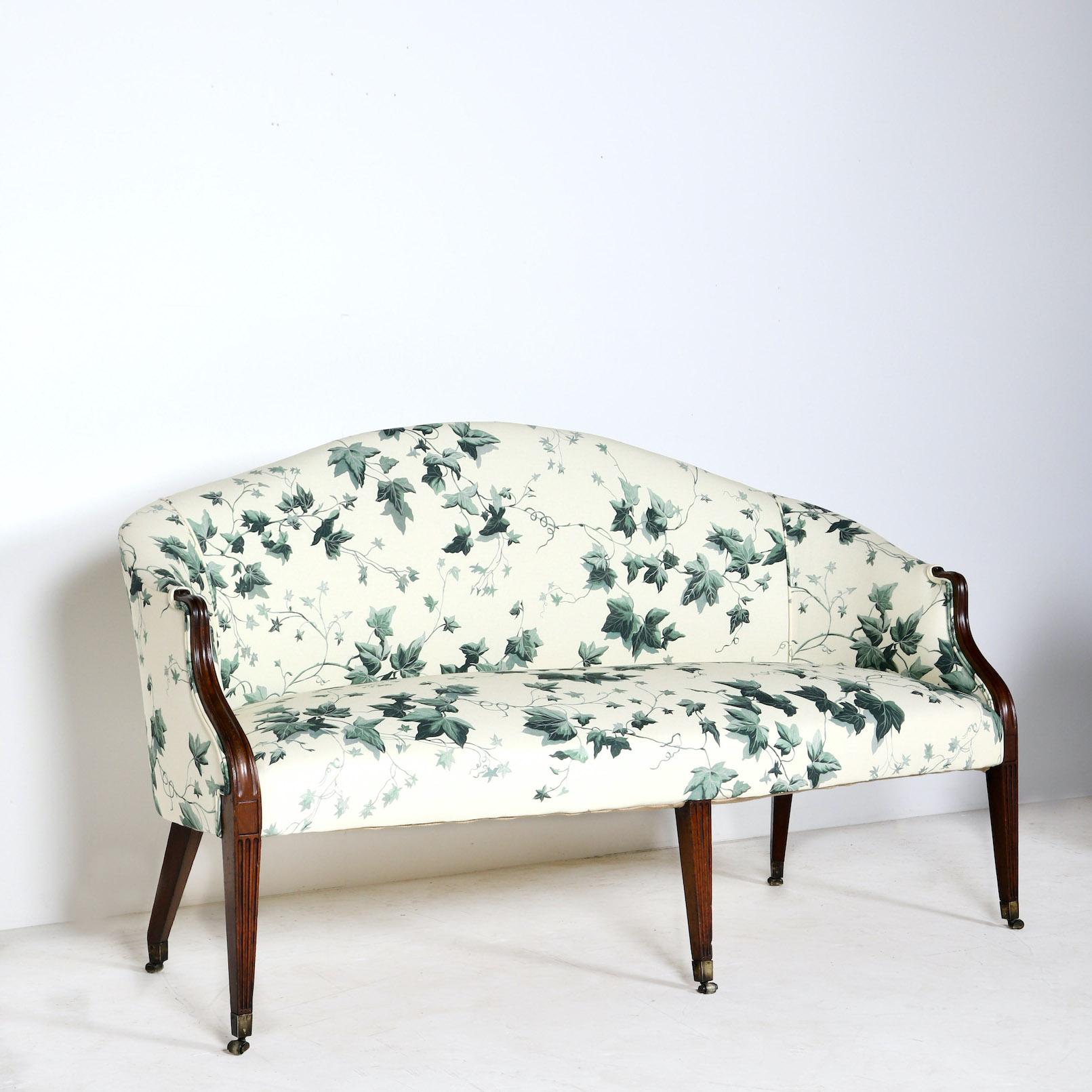 Vagabond Antiques presents a George III sofa

England, Circa 1790

” A stylish shape to this 18th century sofa, re-invented in a Ivy print fabric from ‘House of Hackney’ ”