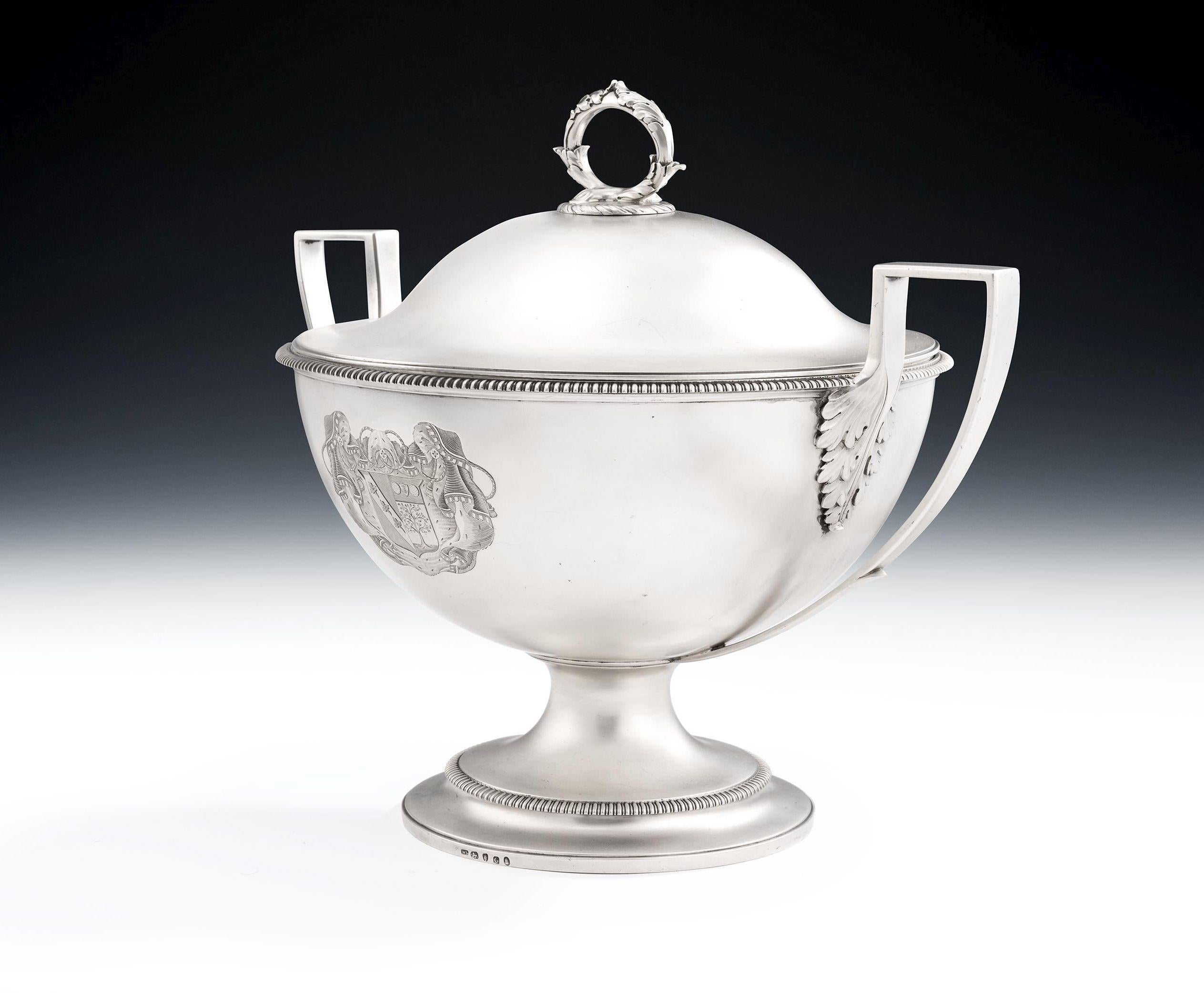 An exceptional George III Soup Tureen made in London in 1802 by William Stroud.

This exceptional piece stands on a circular, stepped, spreading foot decorated with a gadrooned band.  The main body is also of a circular form and rises to an everted