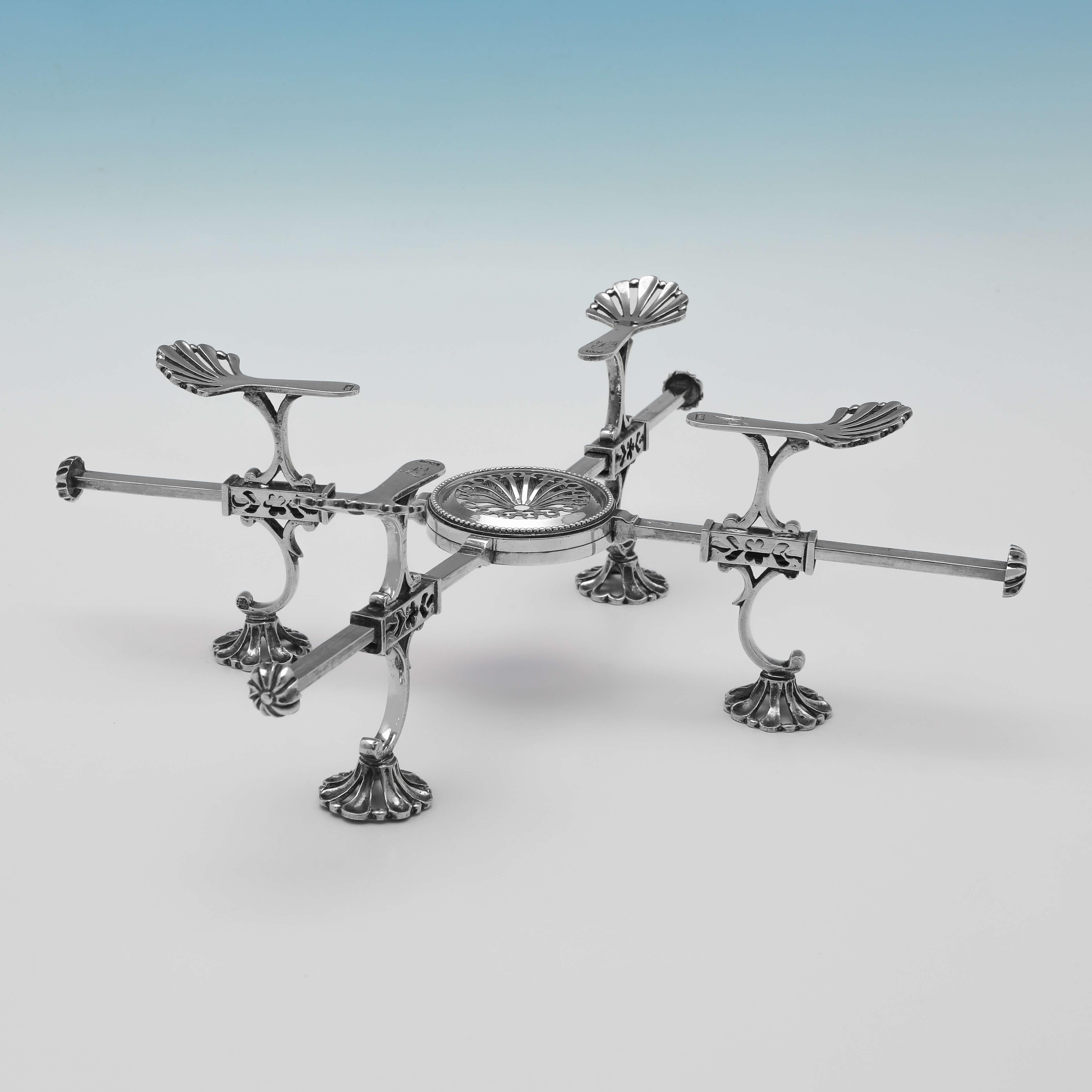 Hallmarked in London in 1777 by William Cripps, this very handsome. Antique Sterling Silver Dish Cross, is of traditional form and is engraved with original initials to 3 of the arms. 

The dish cross measures 3.5