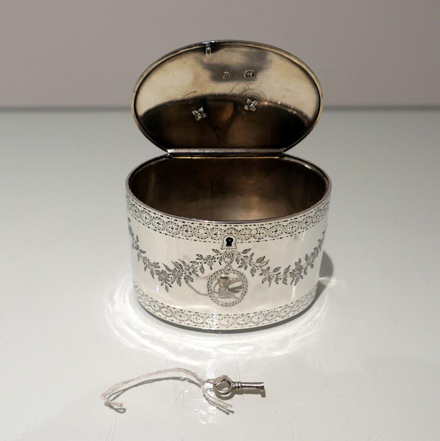 Late 18th Century George III Sterling Silver Oval Tea Caddy London 1776 John Carter For Sale