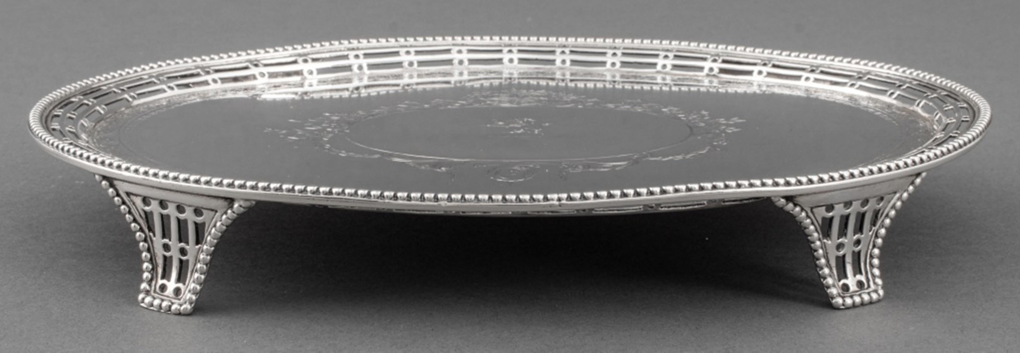 George III sterling silver oval footed stand or waiter, with maker's marks of Robert Makepeace & Richard Carter, London, 1777 to underside with various additional scratch marks including 