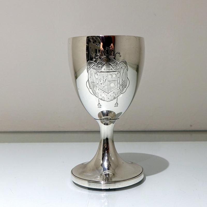 An extremely good quality Georgian plain formed silver wine goblet. The vase-shaped bowl has an elegant contemporary armorial as a focal decorative theme for importance and the inside has been gilded.

 

Weight: 10.8 troy ounces/337