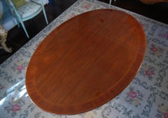 George III Style Banded Mahogany Oval Dining Room Table on Single Pedestal Base