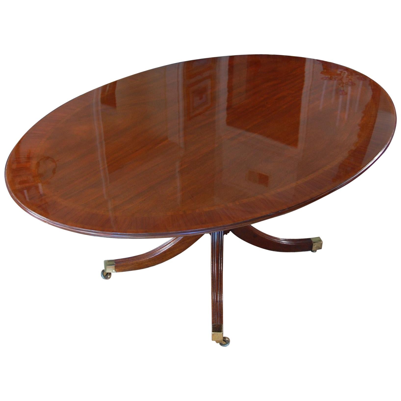 George III Style Banded Mahogany Oval Dining Room Table on Single Pedestal Base
