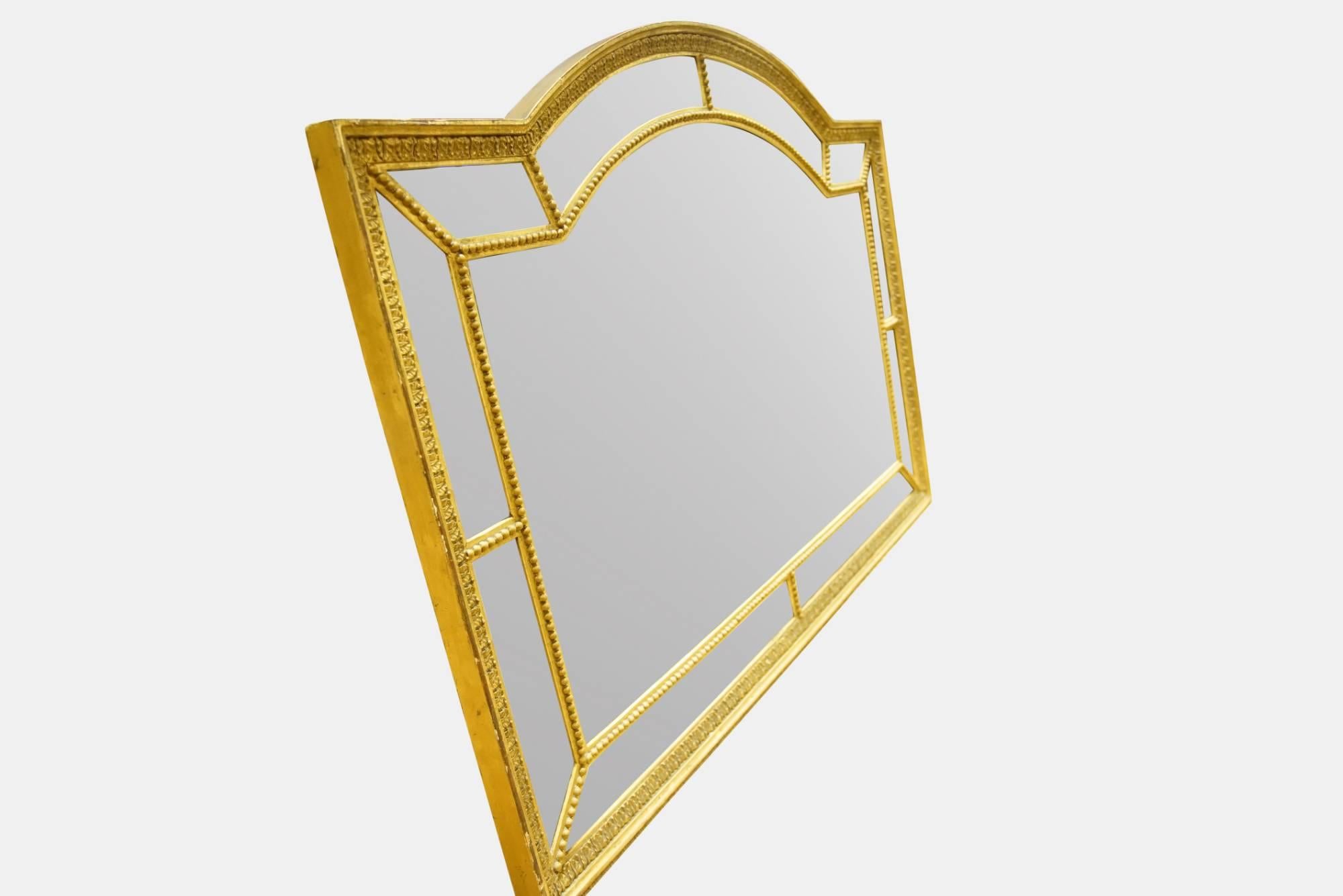 A George III style boarder mirror with arched top,

circa 1900.