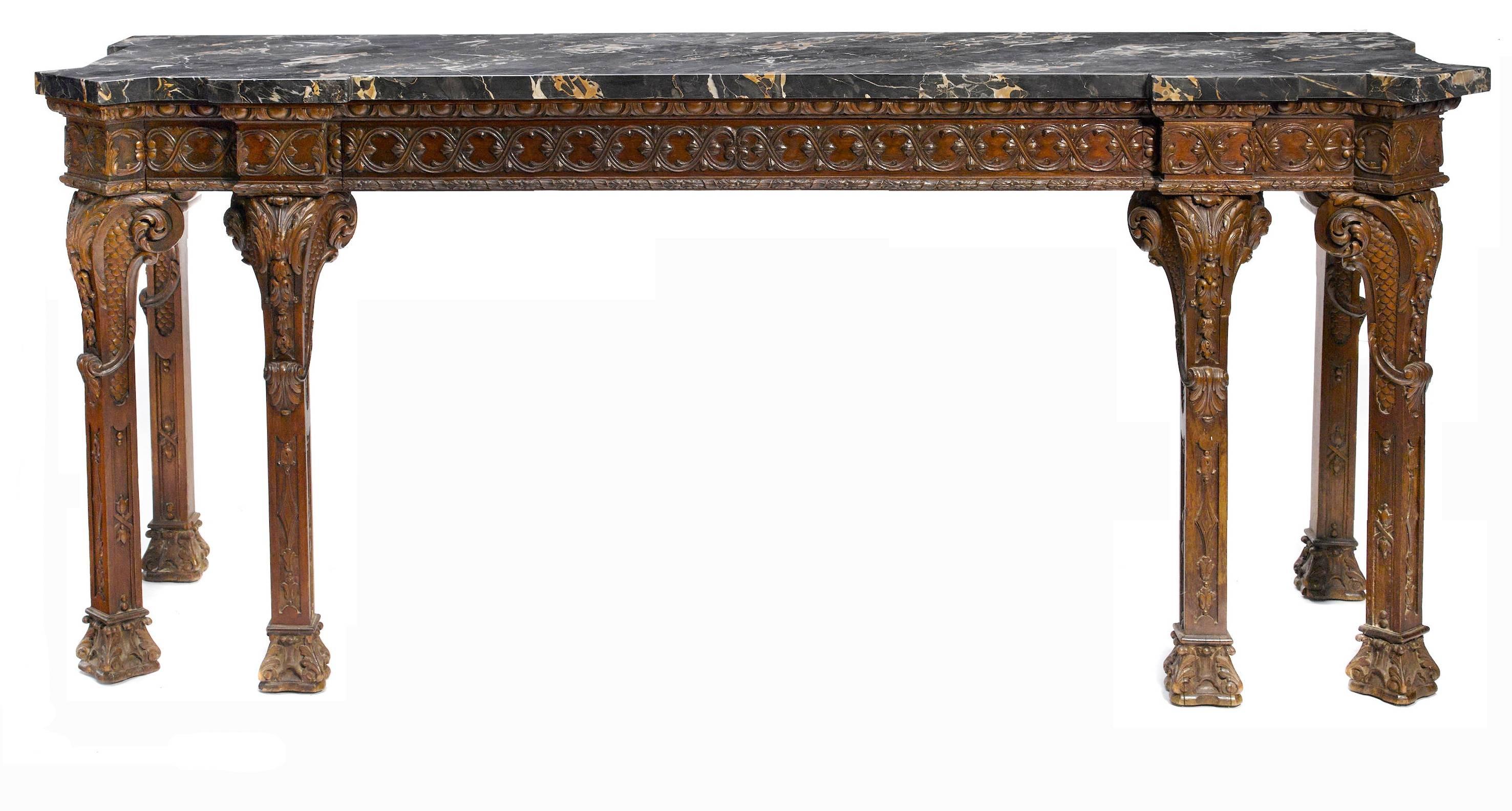 Impressive and large 19th century George III style finely carved mahogany six-legged long console with thick marble top.
Thick marble top over mahogany frieze carved with foliate motif supported by six scrolled legs decorated with scrolling acanthus