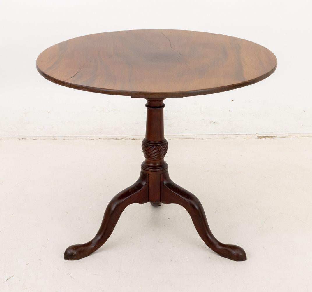 George III Style Mahogany Birdcage Tilt-Top Table, the central turned wood support and three cabriole legs. 27