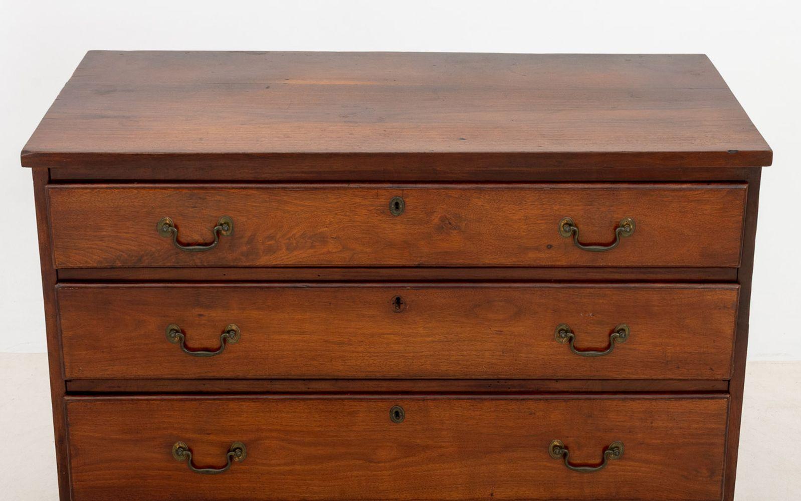 George III Style Mahogany Chest of Drawers, late 19th century, having four graduated drawers with brass handles on four bracket feet. 35.25