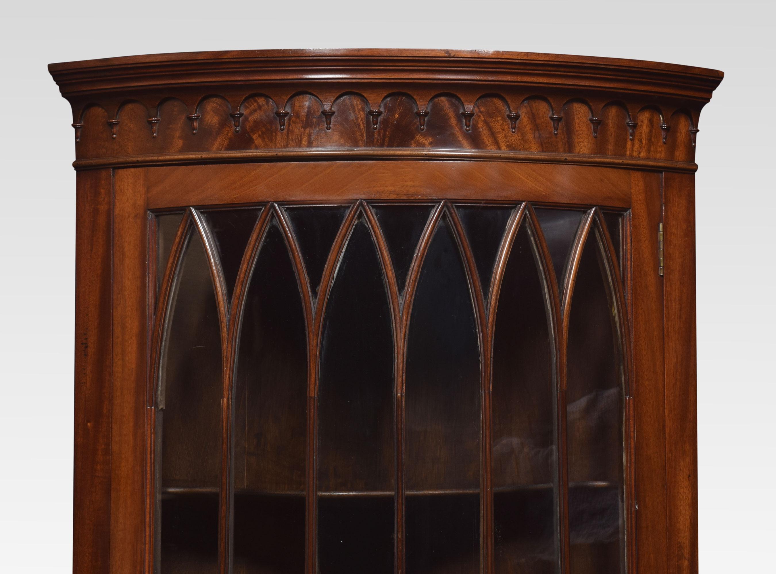 Mahogany standing bow fronted corner cabinet, the bow-fronted astragal glazed full-length door opening to reveal a shelved interior. All raised up on shaped plinth and bracket feet.
Dimensions
Height 72 inches
Width 26.5 inches
Depth 18.5 inches.
