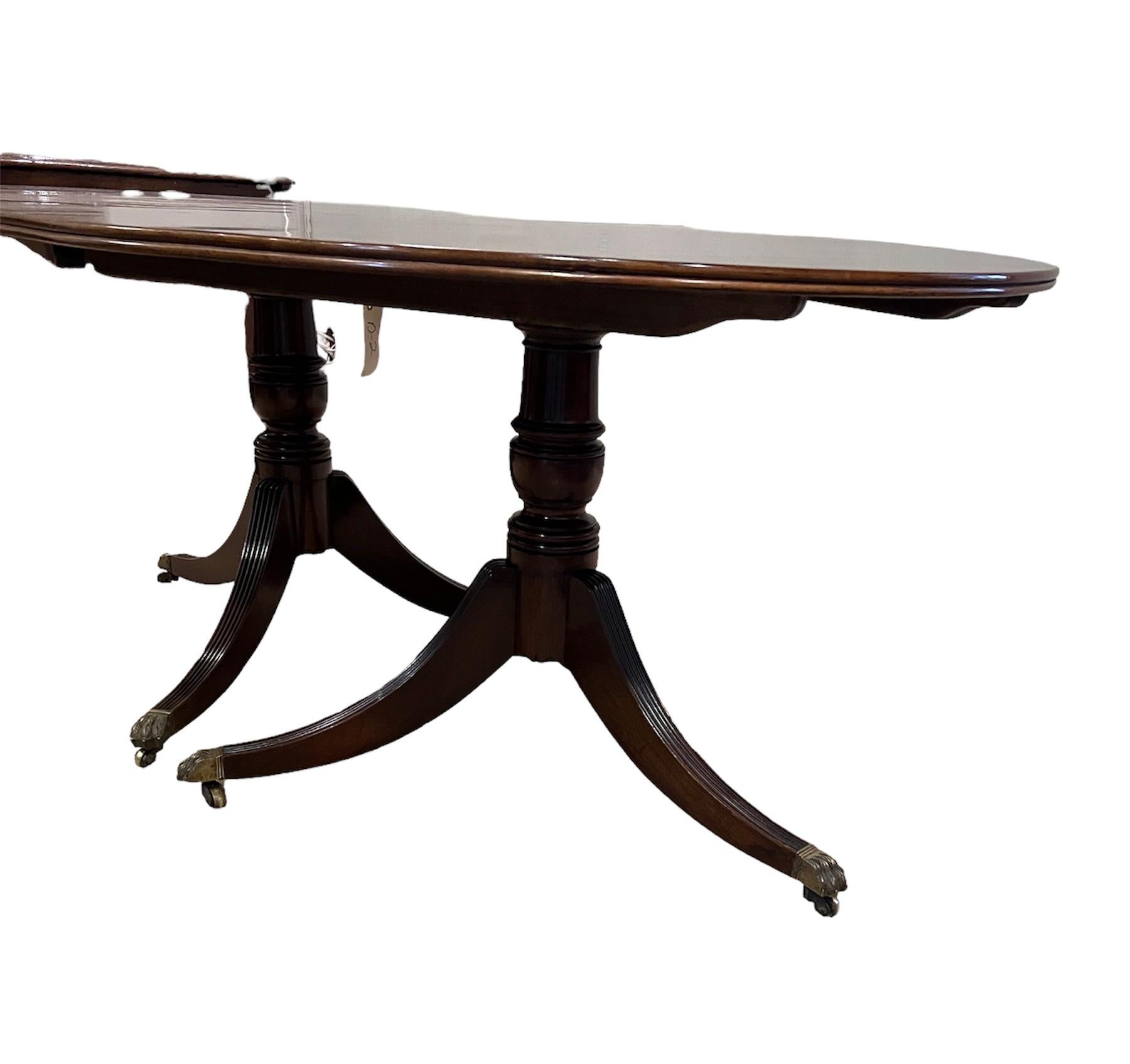 Polished George III Style Mahogany Dining Table. 2 pedestals 2 leaves 