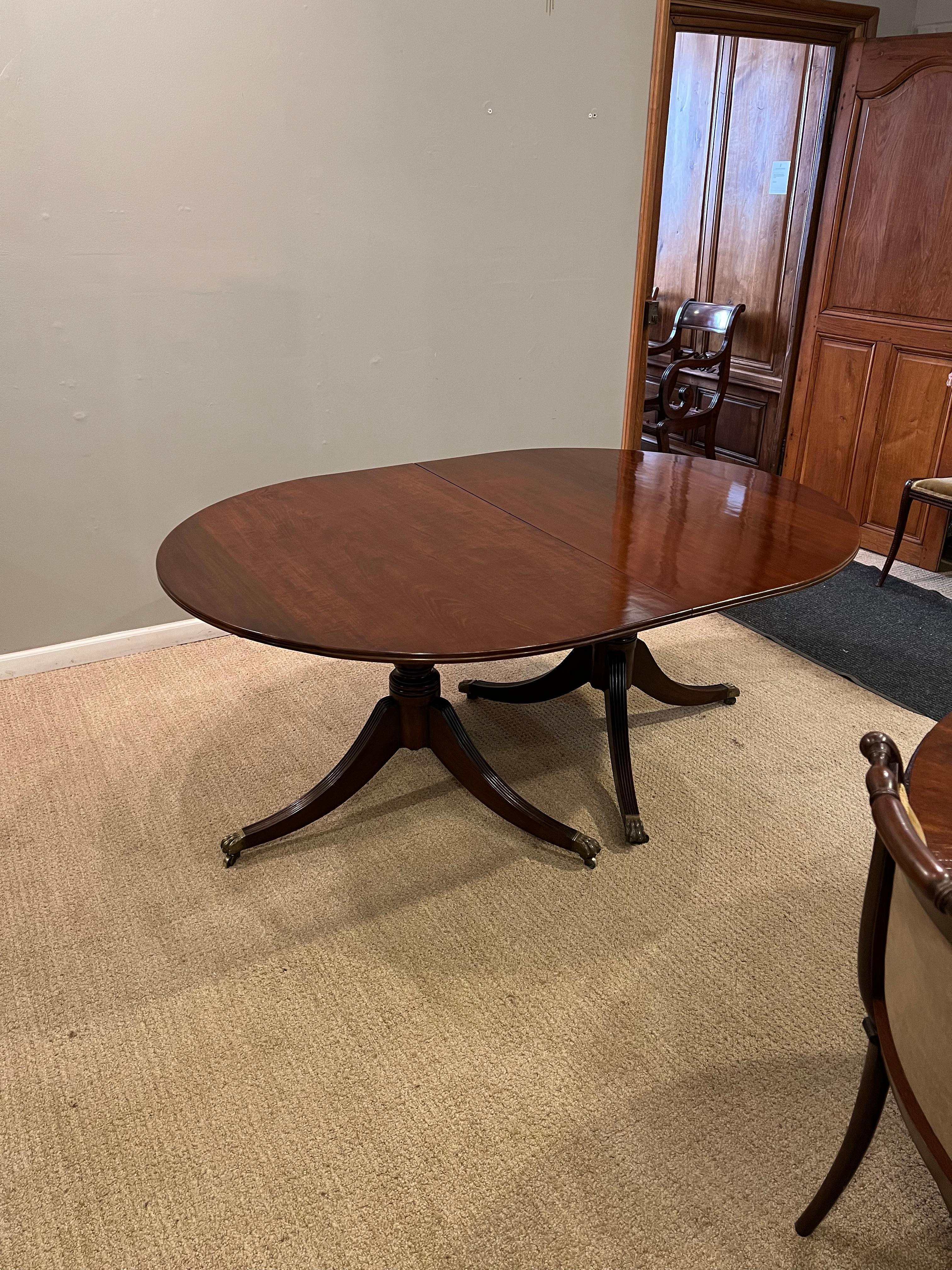 Brass George III Style Mahogany Dining Table. 2 pedestals 2 leaves 