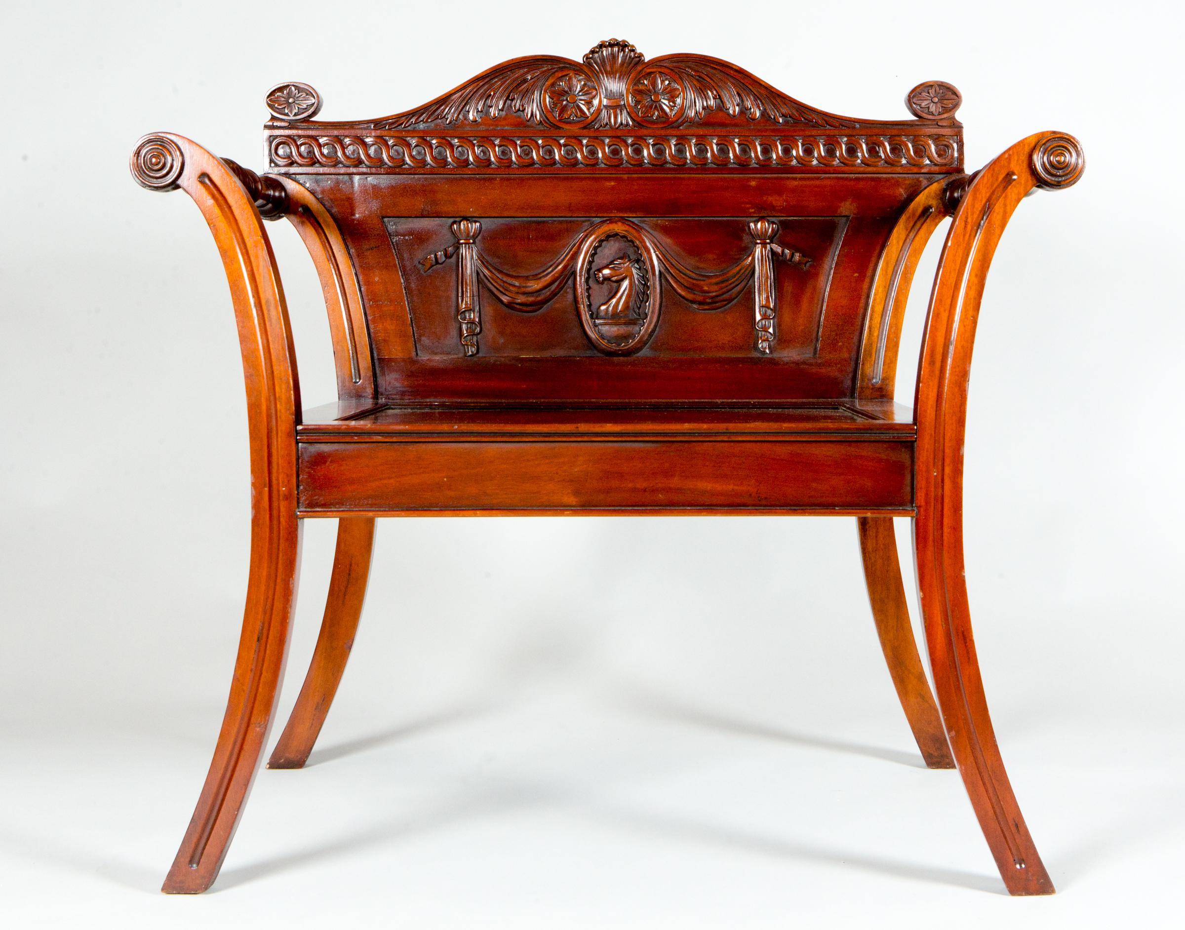 George III Style Mahogany Hall Chair with a classically carved backrest with wheat, flowers, and a horse.