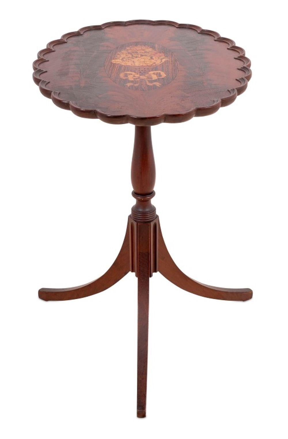 George III Style Flame Mahogany, Rosewood, and Marquetry Tripod Table, 20th century, the hinged scalloped top above a tapering column on three splayed legs. 28