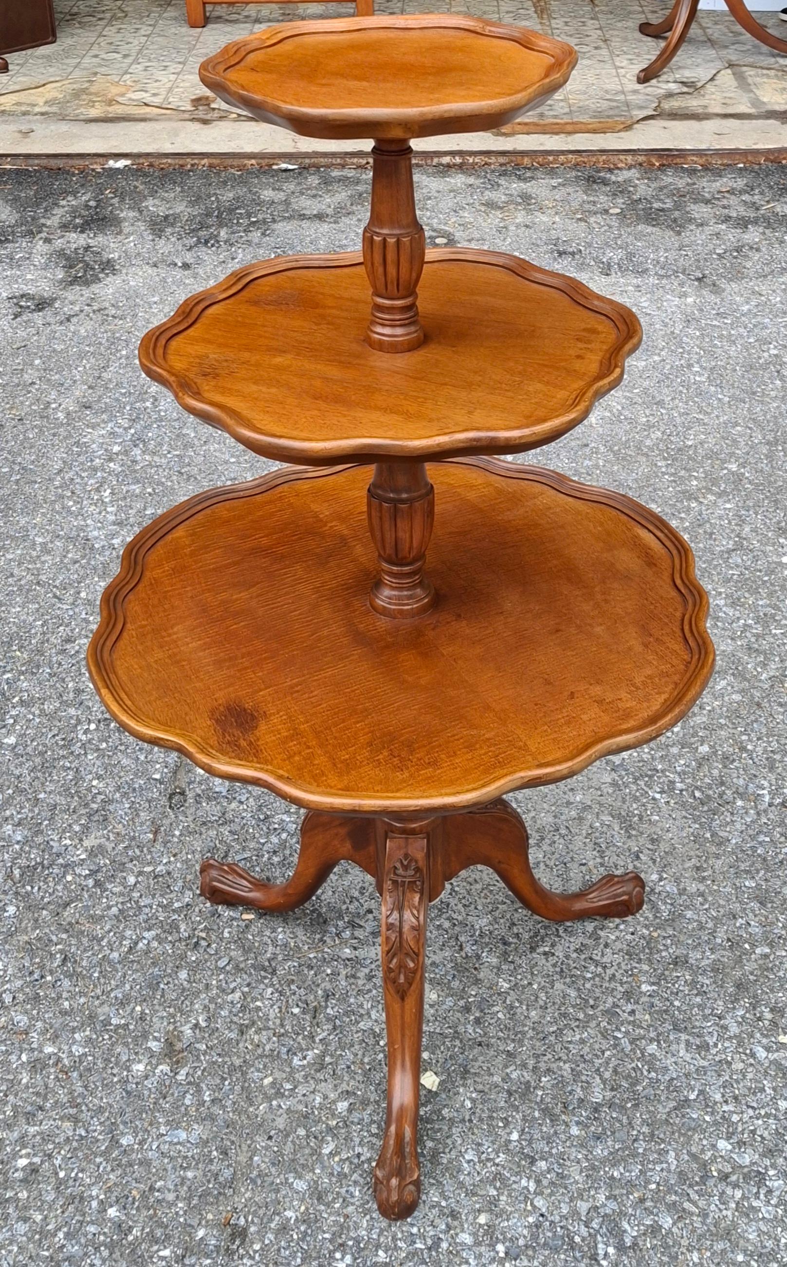 And early 20th Century George III Style Mahogany Three Tier Dumdwaiter by Mersman.  Largest tray is 23.25