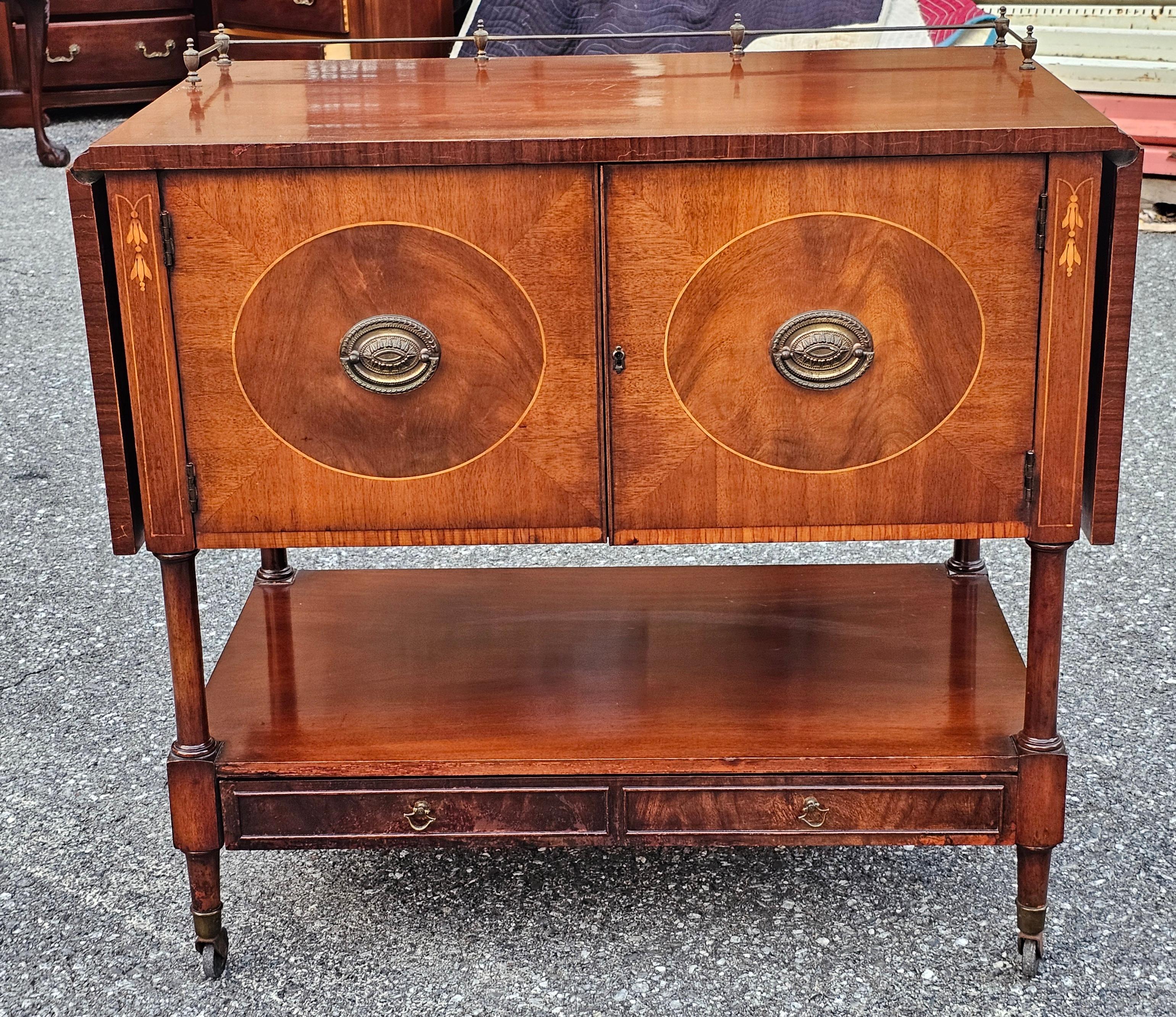 George III Style Marquetry Inlaid Mahogany Drop Leaf Gallerried Wheeled Dry Bar with Large Glass tray. 
Measure 65