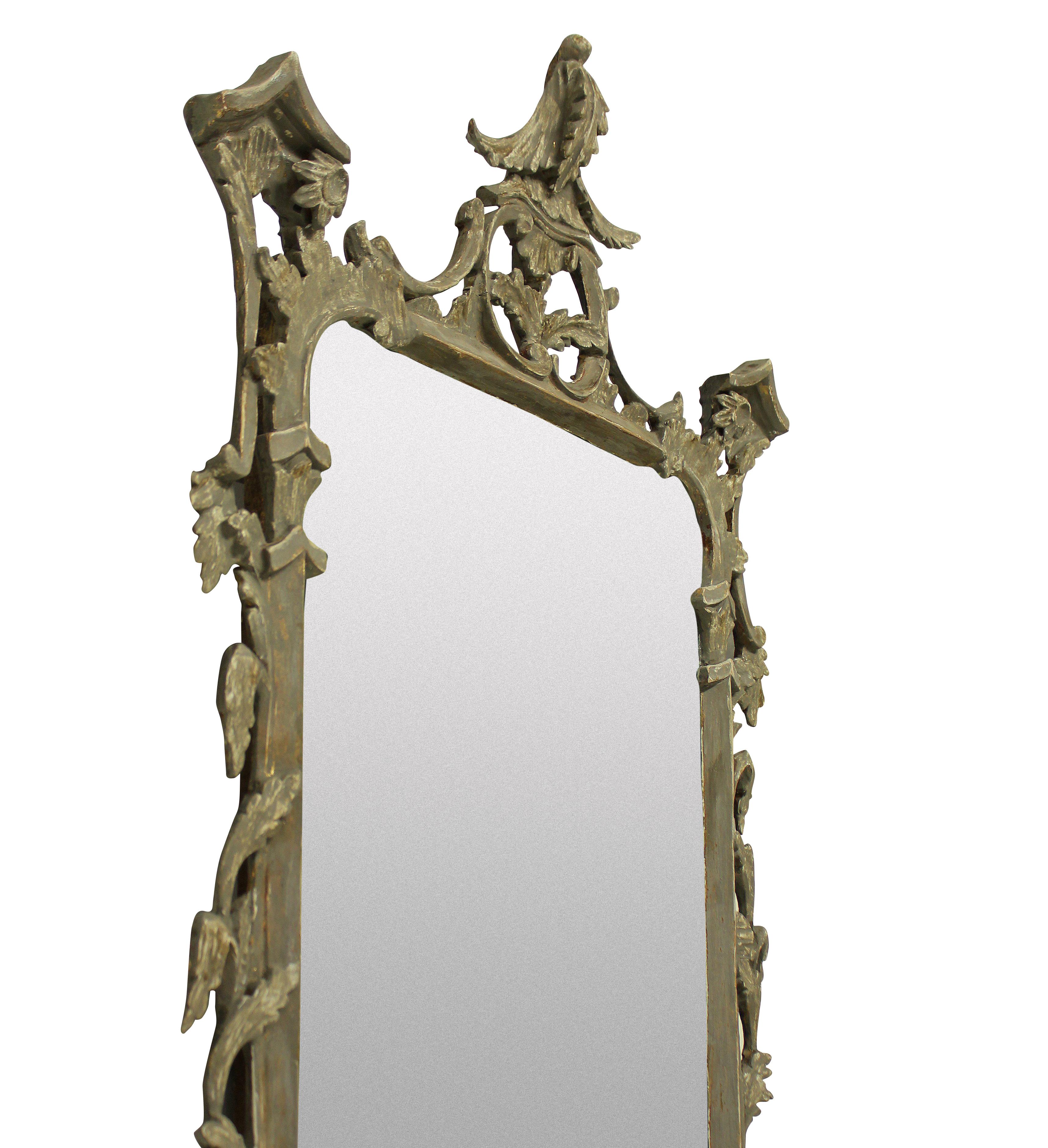 An English George III style carved and painted Chinese Chippendale style mirror.