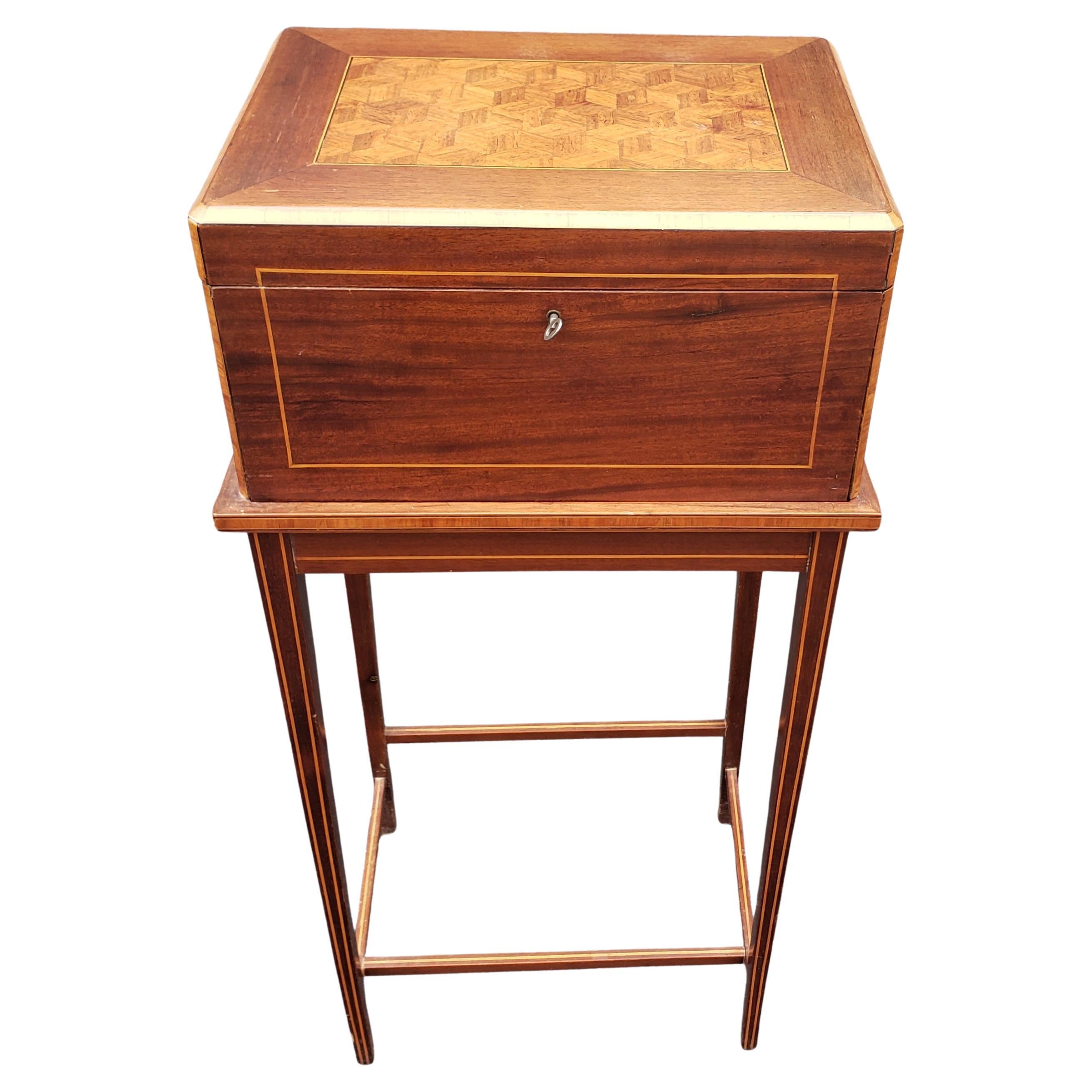 George III Style Satinwood inlays And Parquetry mahogany dresser box on stand with pull out tray and a functional lock in great condition. Features 2 drawers and a top organizing tray, a beveled mirror. Key present.