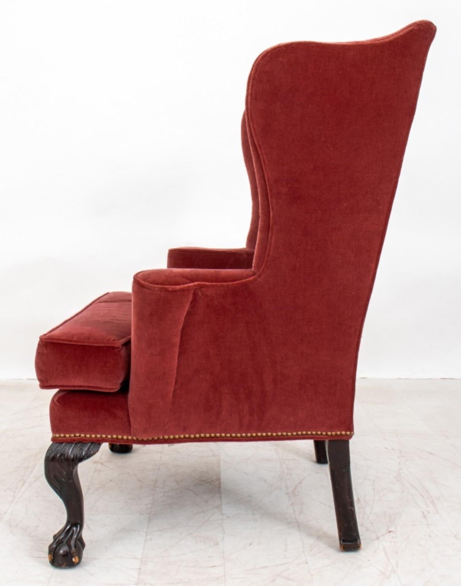 red velvet wingback chair