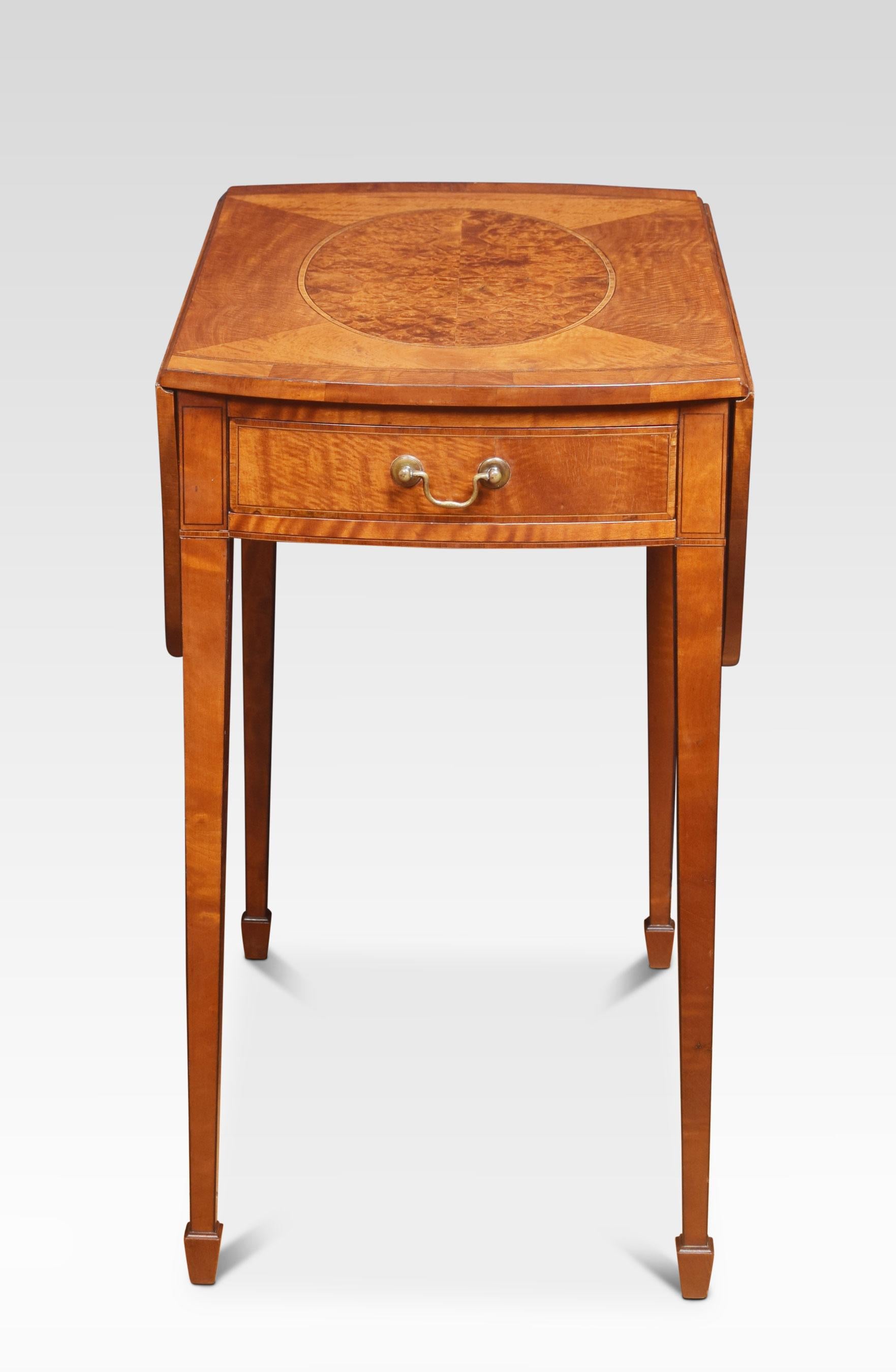 George III style satinwood Pembroke table, the oval top with central amboyna inlay incorporating two hinged flaps, above a drawer, on square section tapering legs, terminating in spade feet.
Dimensions
Height 29.5 inches
Width 17.5 inches when