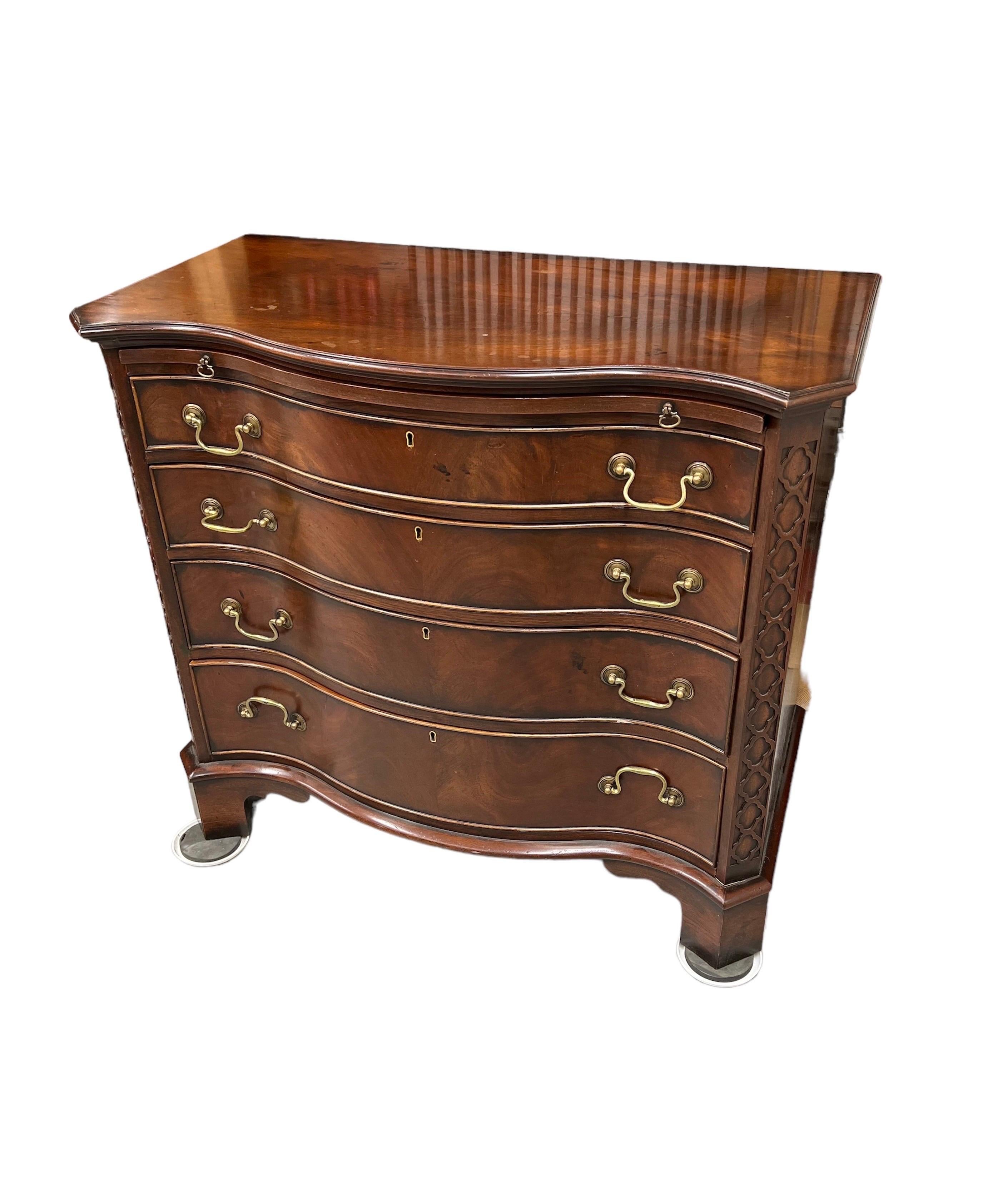 George III Style Serpentine Mahogany Chest of Drawers 
With 5 drawers in graduated sizes also with draw out brushing slide 

From KEITH SKEEL LOUDHAM HALL COLLECTION This lovely 
Mahogany Chest of drawers is a great classic option.
