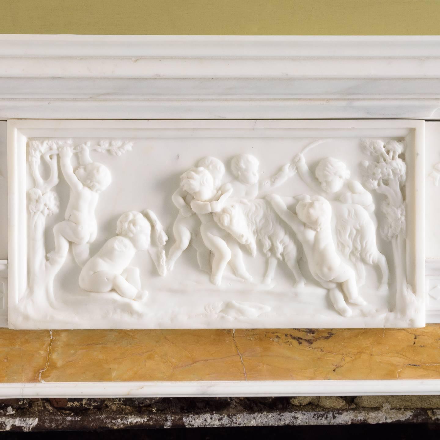 Carved George III Style Statuary and Sienna Marble Fireplace
