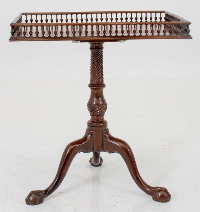 George III style tilt-top tri-pod side table with three ball and claw feet. 

Dealer: S138XX