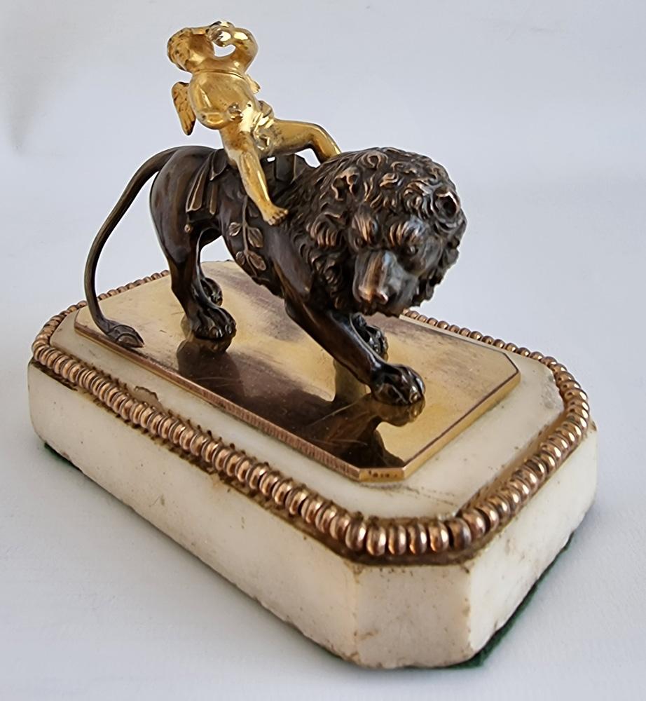 A magnificent quality and very rare English George III or Regency white marble, patinated bronze and ormolu paperweight by the eminent maker Thomas Weeks of Tichborne St. London. On a rectangular Carrera white marble base with canted corners and