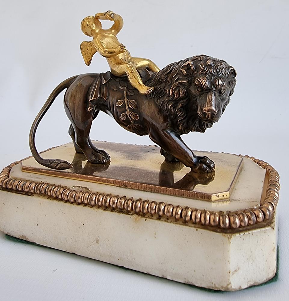 Bronze George III Thomas Weeks Paperweight of Cupid Riding a Lion For Sale