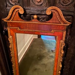 George II Walnut and Parcel-Gilt Mirror