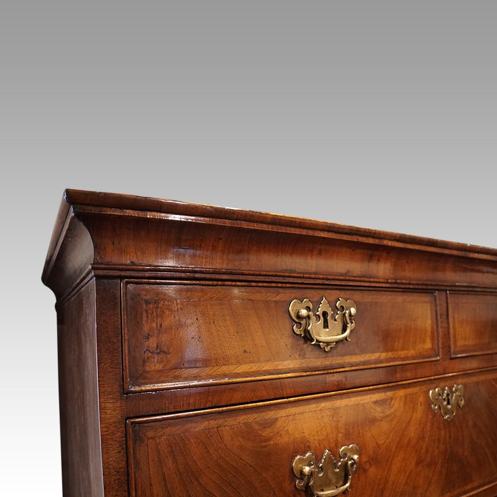 This George III walnut chest on chest was made circa 1790.

These are also known as tallboys.

It is of a rare small size and also being made in the most desirable walnut veneers.

The chest on chest is made in 2 parts, this allows for easy