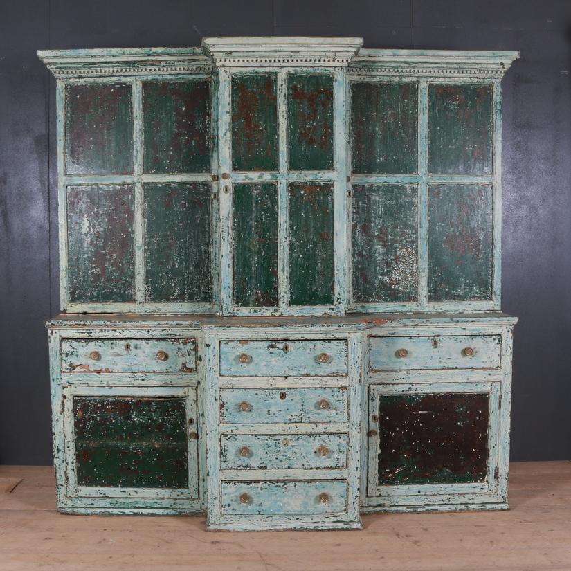 Superb 18th century Geo III west country breakfront housekeepers cupboard with amazing old paint. 1790

Reference: 5499

Dimensions
89 inches (226 cms) wide
28 inches (71 cms) deep
85 inches (216 cms) high.