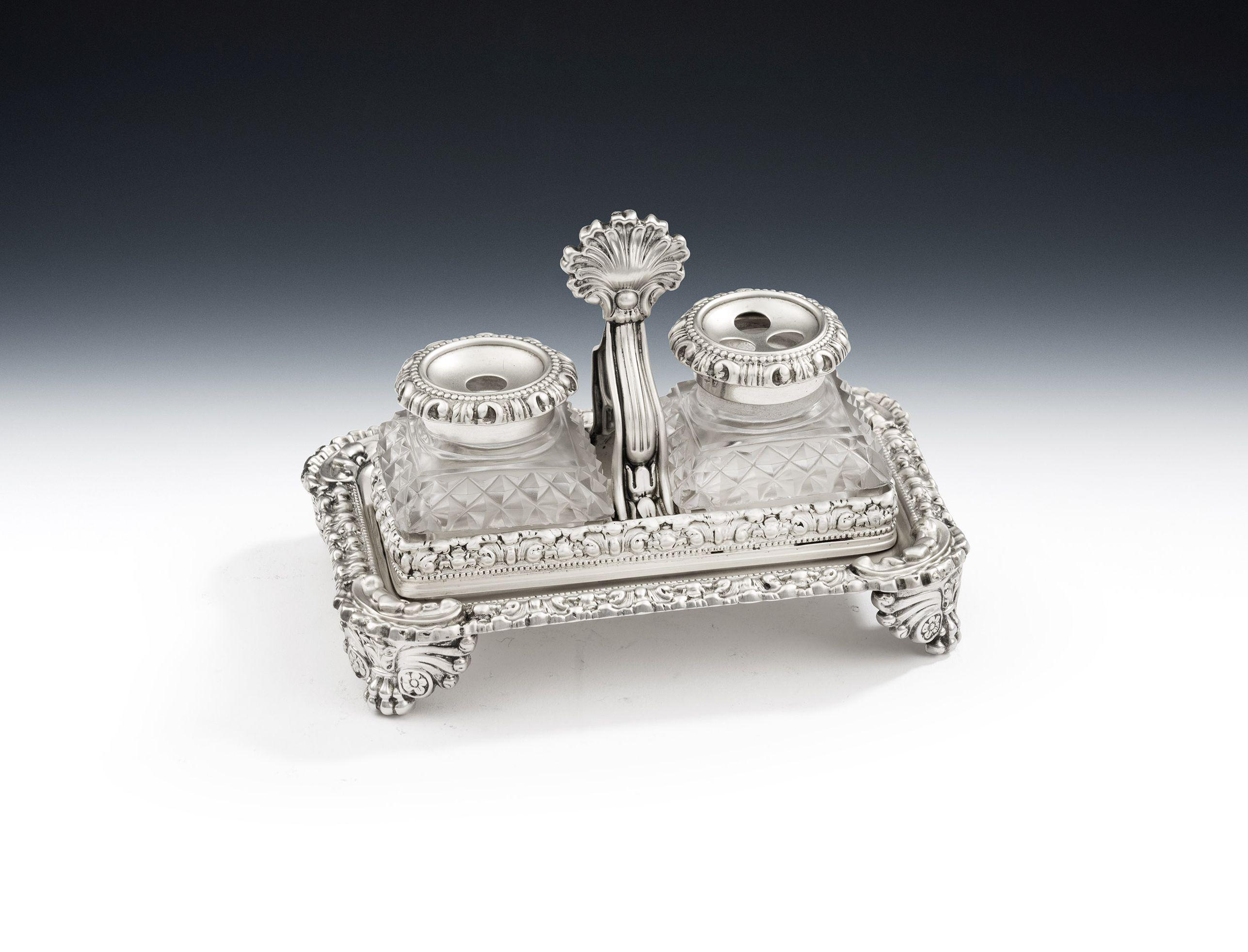 In the manner of Paul Storr. A very rare George IV Bachelor Inkstand made in Sheffield in 1822 by Thomas & James Settle.

This exceptionally rare Inkstand is modelled in the bachelor size and is modelled in the manner of Paul Storr's designs. As you