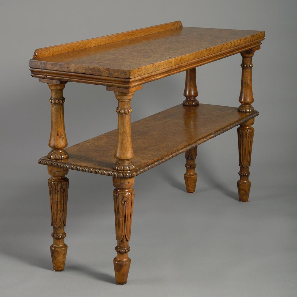 A George IV burr oak two-tier side table, circa 1830.