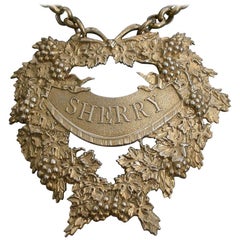 Antique George IV Cast Silver Gilt Festooned Drapery Wine Label 'Sherry', 1829