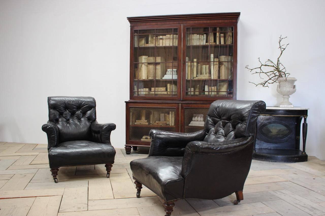 A good quality and of elegant proportions, English George IV mahogany library bookcase with brass detail, retaining the original glass and with adjustable shelves.